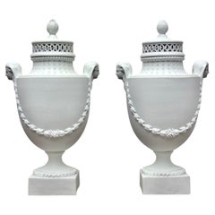 A Pair of Egyptian Revival Biscuit Porcelain Pot-Pourri Vases and Covers