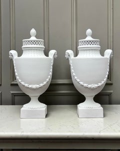 A Pair of Egyptian Revival Biscuit Porcelain Pot-Pourri Vases and Covers
