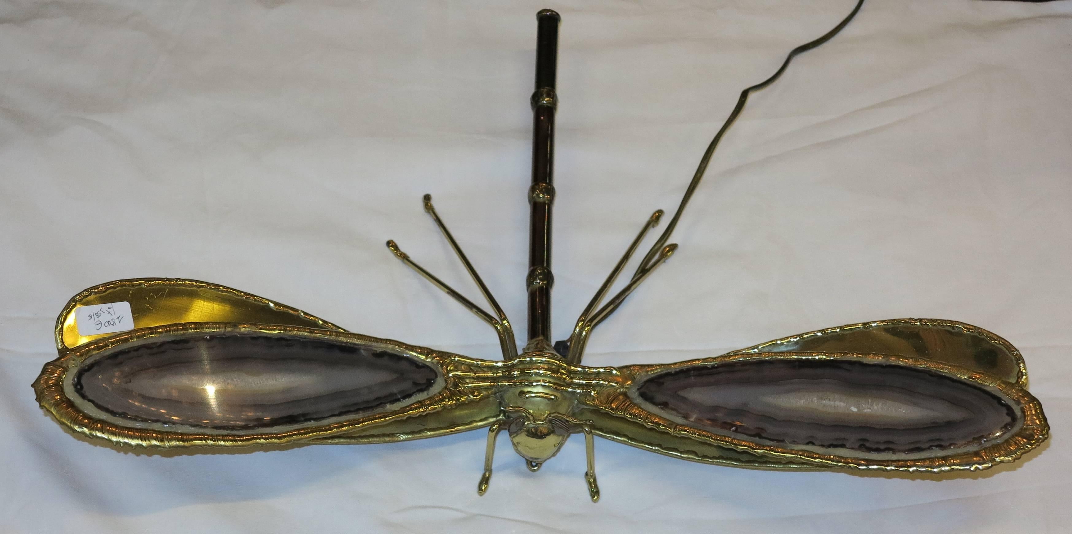 Bronze wall lamp has decoration of dragonfly, two bulbs, wings in  agate , good condition, circa 1970.
