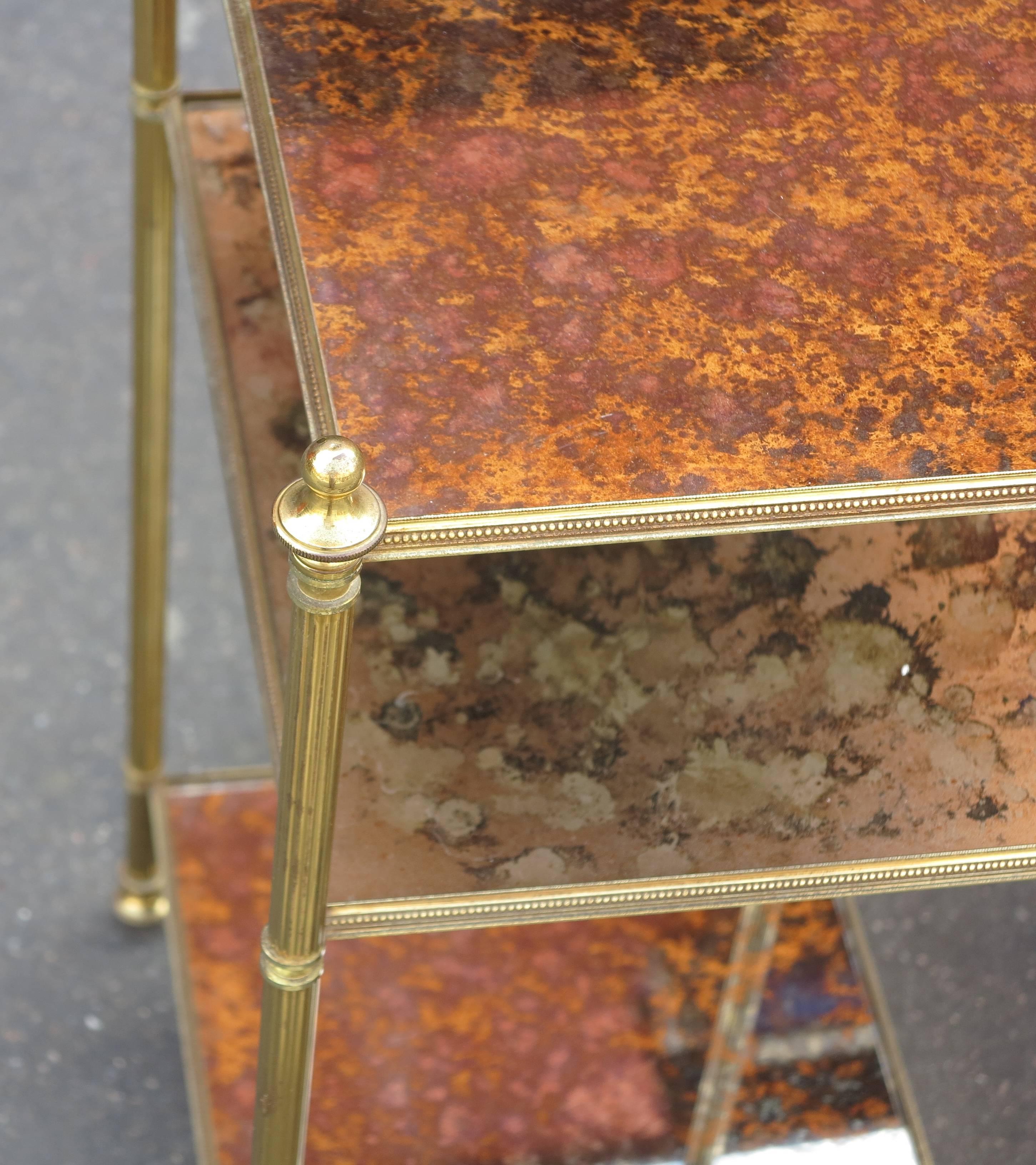  end of sofa gold-colored bronze with three levels in oxidized silver mirrors, rising screwed, circa 1950-1970, good condition.