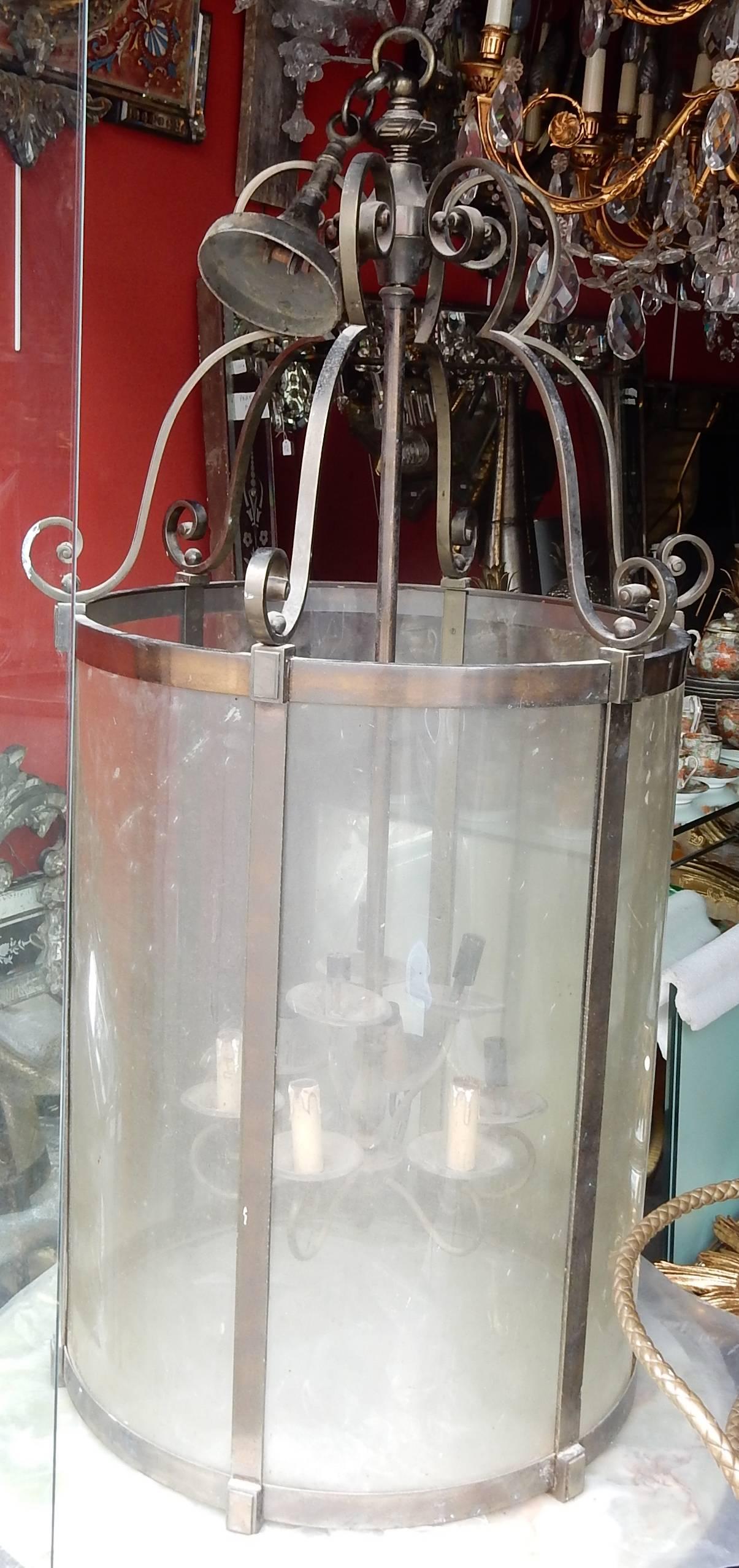 Big lantern from Maison Jansen in silvered bronze, height without the chain 160 cms, nine lamps, circa on 1950-1960, good condition, six rounded glasses, height of the cylinder 79 cm, everything is screw, weight: 25 Kg, coming from a Parisian