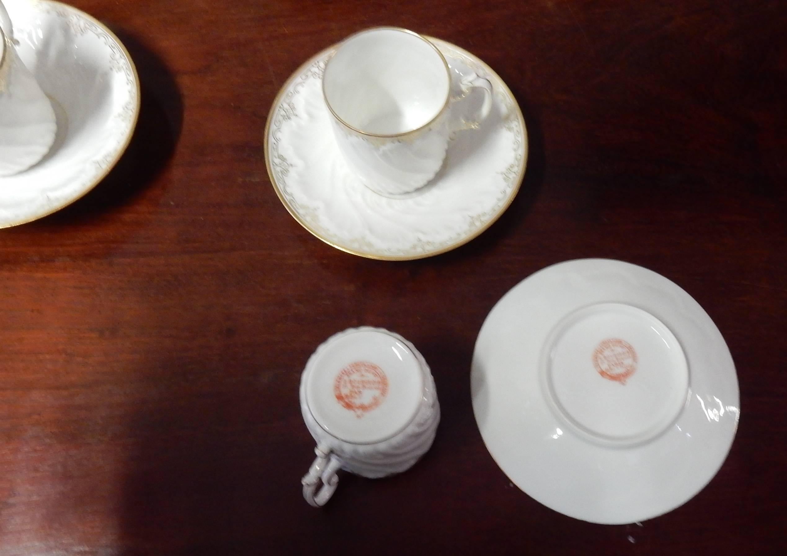 1900 coffee service in porcelain, E Bourgeois 21 rue Drouot Paris, 14 cups and cups plates, cofee pot, sugar bowl, milk pitcher, 1900 gold decoration, art nouveau relief, good condition