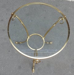 Guéridon de style Maison Charles de 1970 à 1980 en bronze doré avec plateau en verre