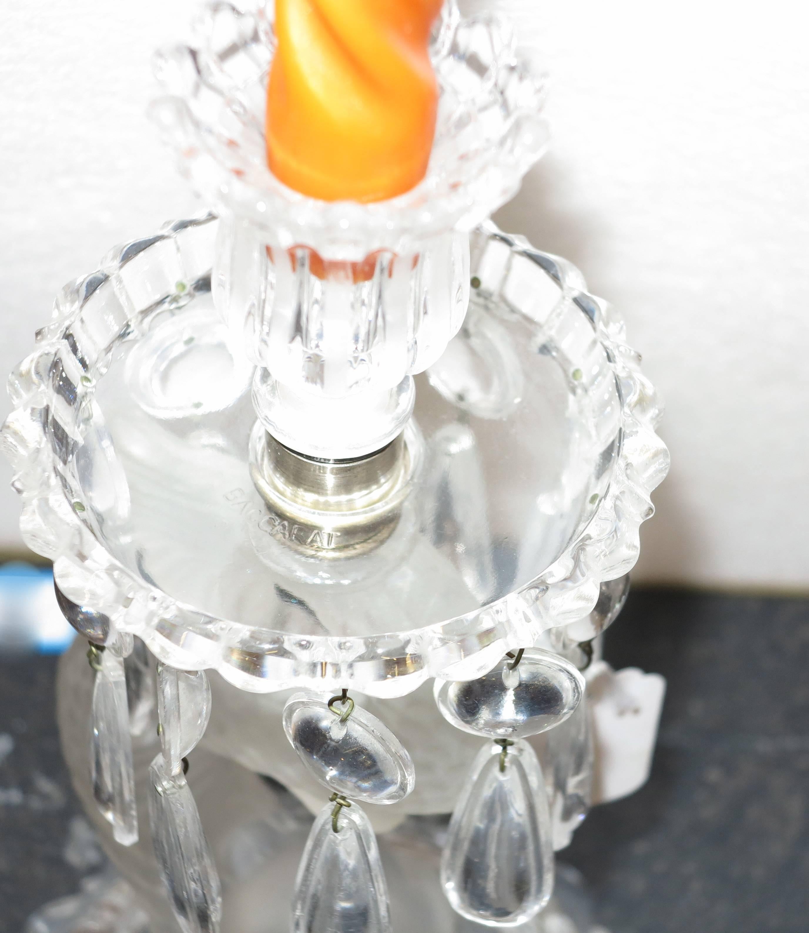 Pair of crystal signed candlesticks  Baccarat, conditions of use, circa on 1950