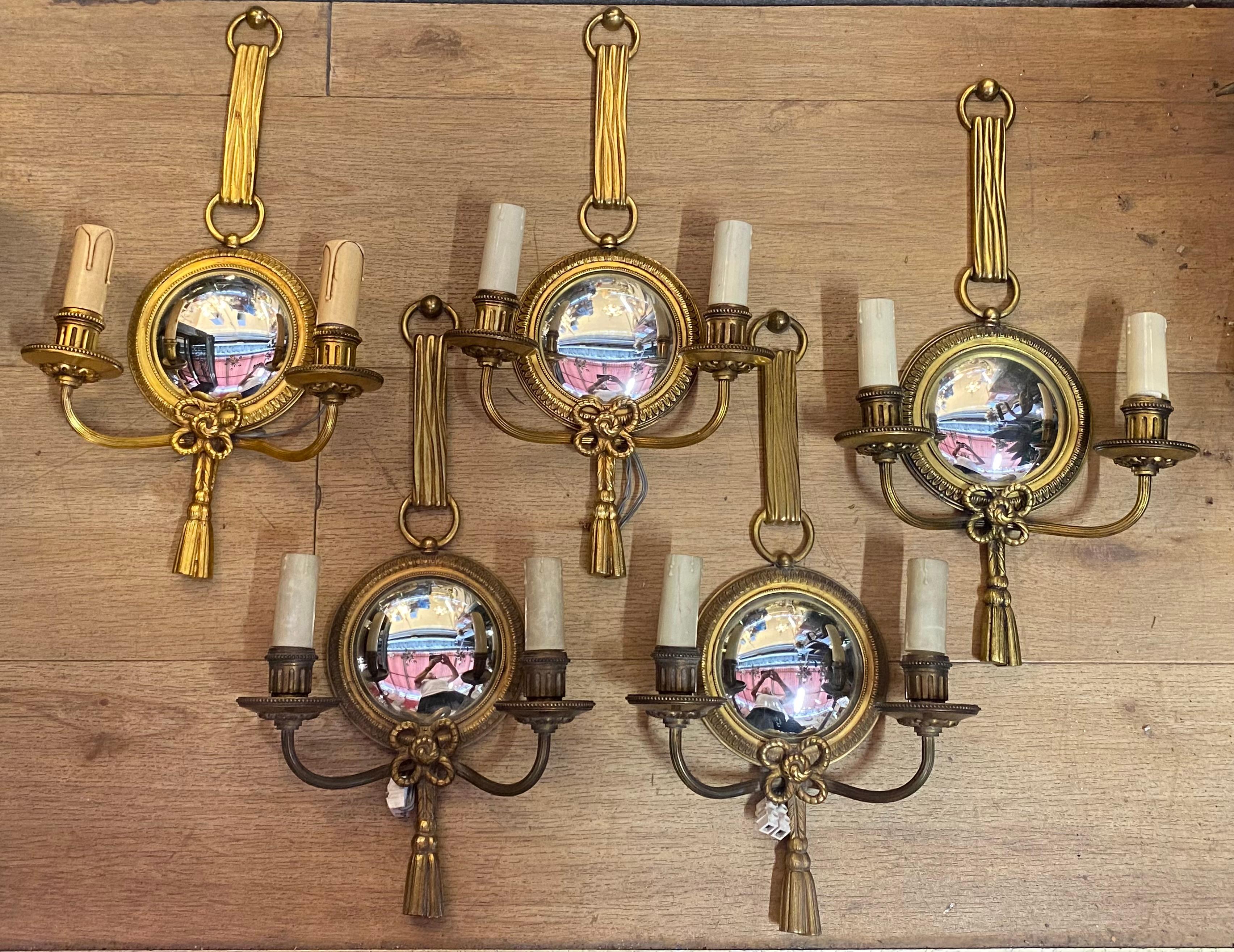 Serie of 5 sconces with convex mirror, gilted bronze,
 good condition, 
Petitot signed, 
everything is screwed.
Circa 1950/70
Diameter frame mirror 14 cm
Diameter mirror 10 cm

Width : 23 cm
Height : 42 cm
Depth : 9 cm
Shipping packaging and