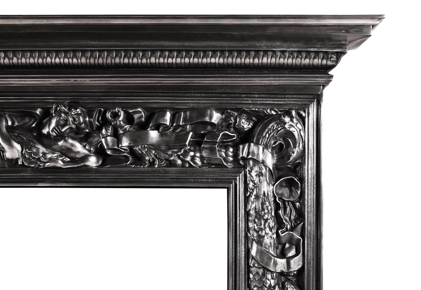 An impressive polished cast iron fireplace. The frieze with reclining classical figure, flanked by tied ribbons and cascading foliage. Moulded shelf above. English, Victorian.

Shelf Width - 1622 mm    63 ⅞ in
Overall Height - 1308 mm    51 ½