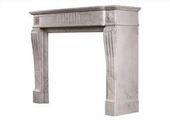 Cheminée de style Louis XVI en marbre de Carrare