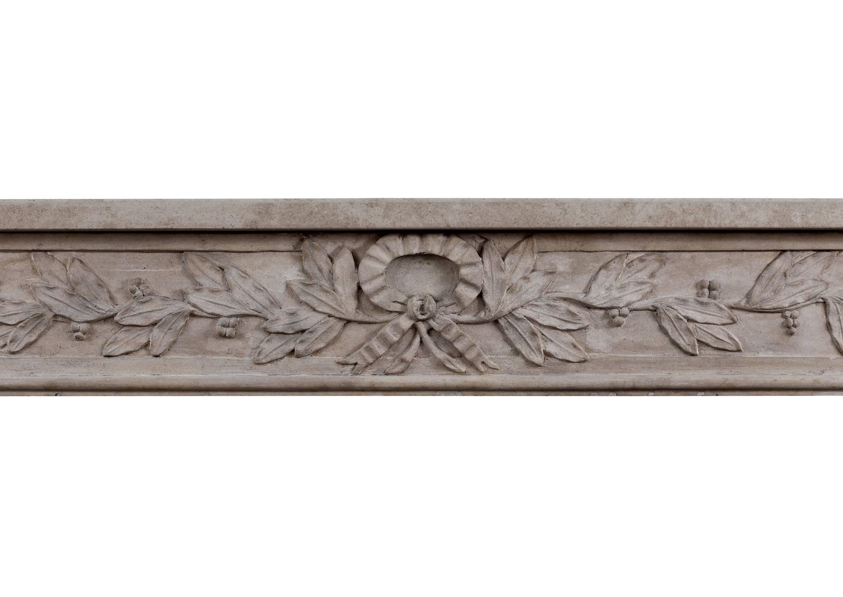 Ornately Carved French Limestone Fireplace in the Louis XVI Style For Sale 1