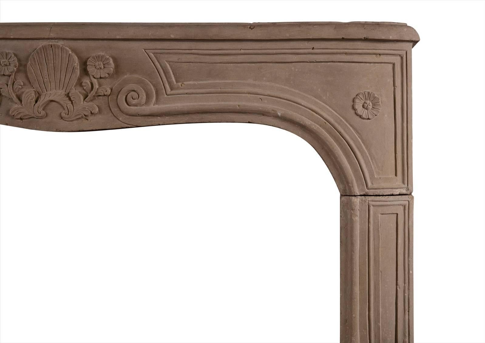 French Carved Louis XV Limestone Fireplace For Sale