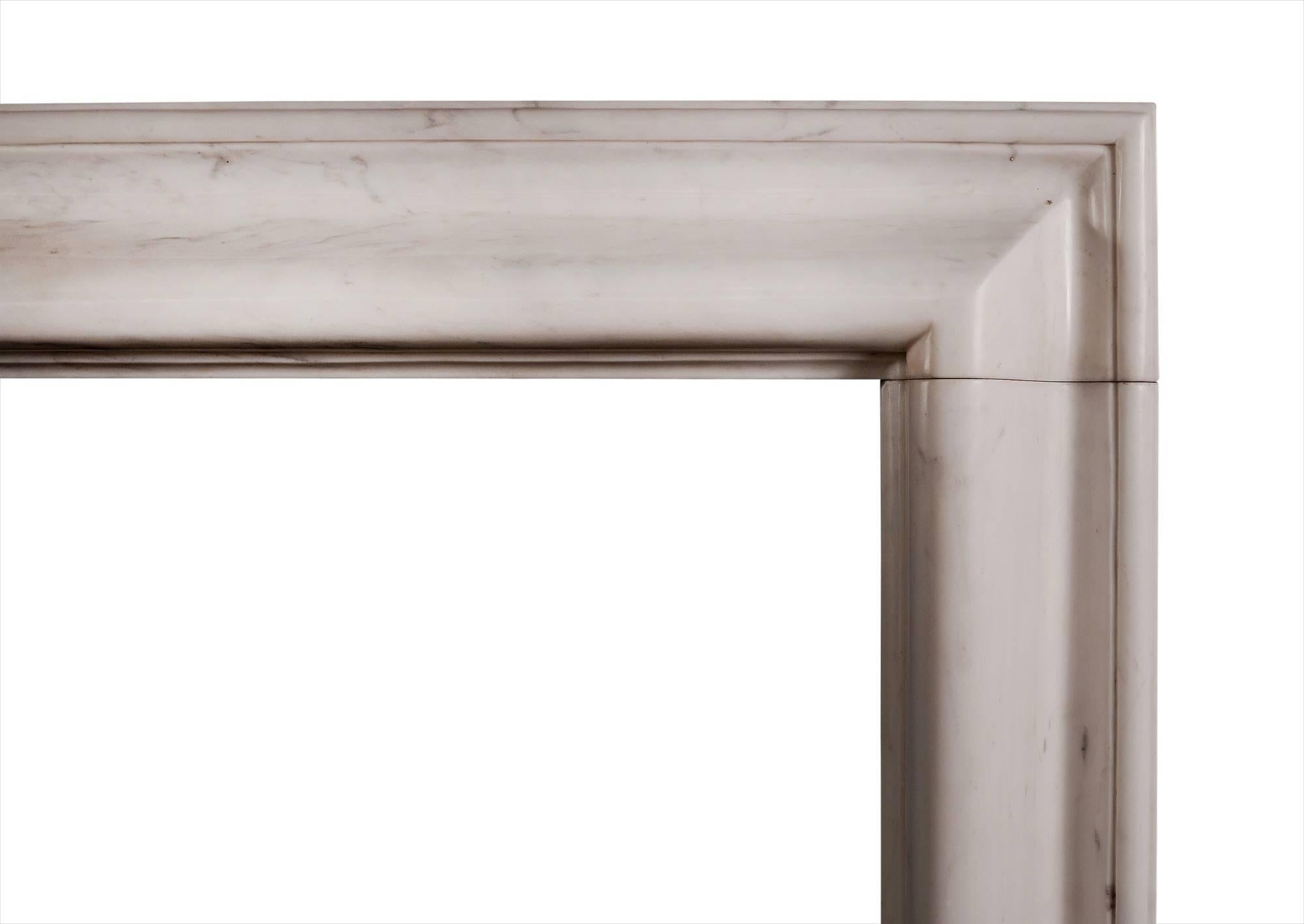 An attractive English bolection fireplace in a white marble. An unusually deep, substantial moulding with good quality white marble. A copy of the Queen Anne design. Also available in other marbles if required.

Shelf width:            1420 mm /    