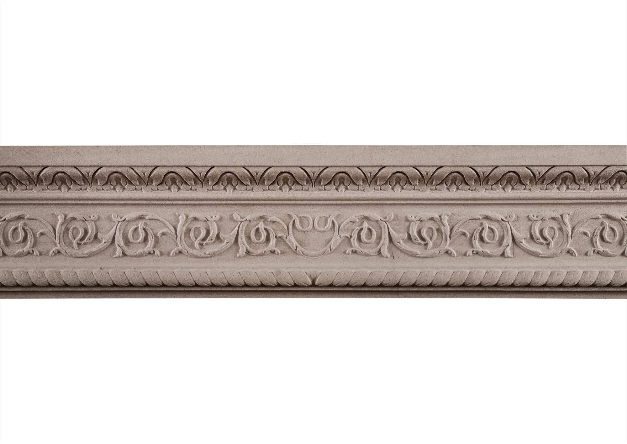 A Classic carved limestone fireplace with flowing scrolled detailing to frieze and jambs with leaf and rope mouldings and outer and inner edges respectively. A timeless and elegant 18th century design could be made in bespoke sizes.

Measures: