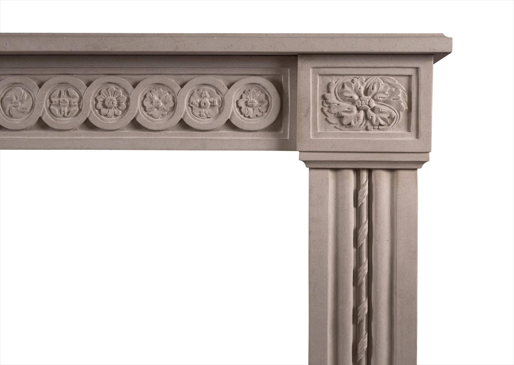 A well-proportioned French Louis XVI style fireplace carved in Portland stone. The carved frieze of guilloche and paterae, shaped jambs of reeded form with carved rope moulding, surmounted by oval pateras. A copy of an 18th century original.

Shelf