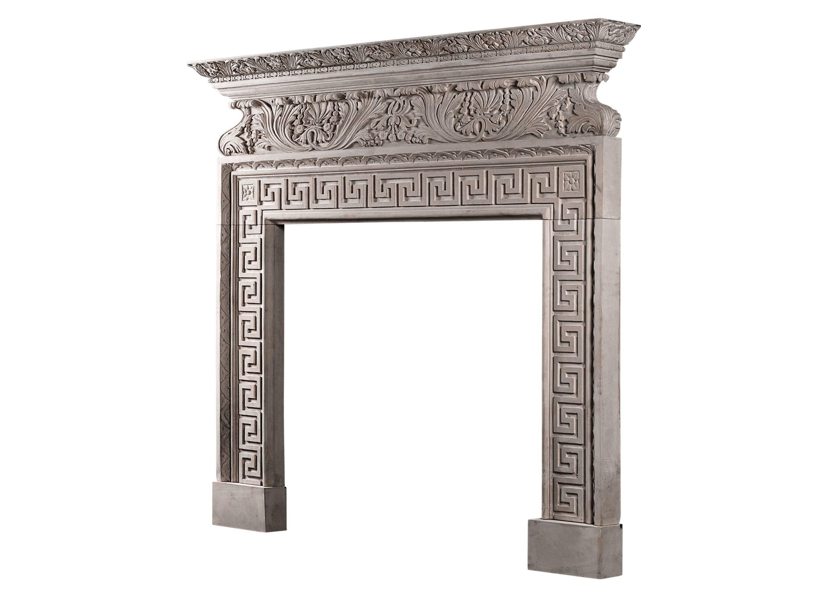 An Italian Baroque style fireplace richly carved from Portland stone. The ogee shaped frieze with carved acanthus leaves, shells and flowers. Similar carving to moulded shelf, and Classical Greek key to jambs. A quality reproduction
