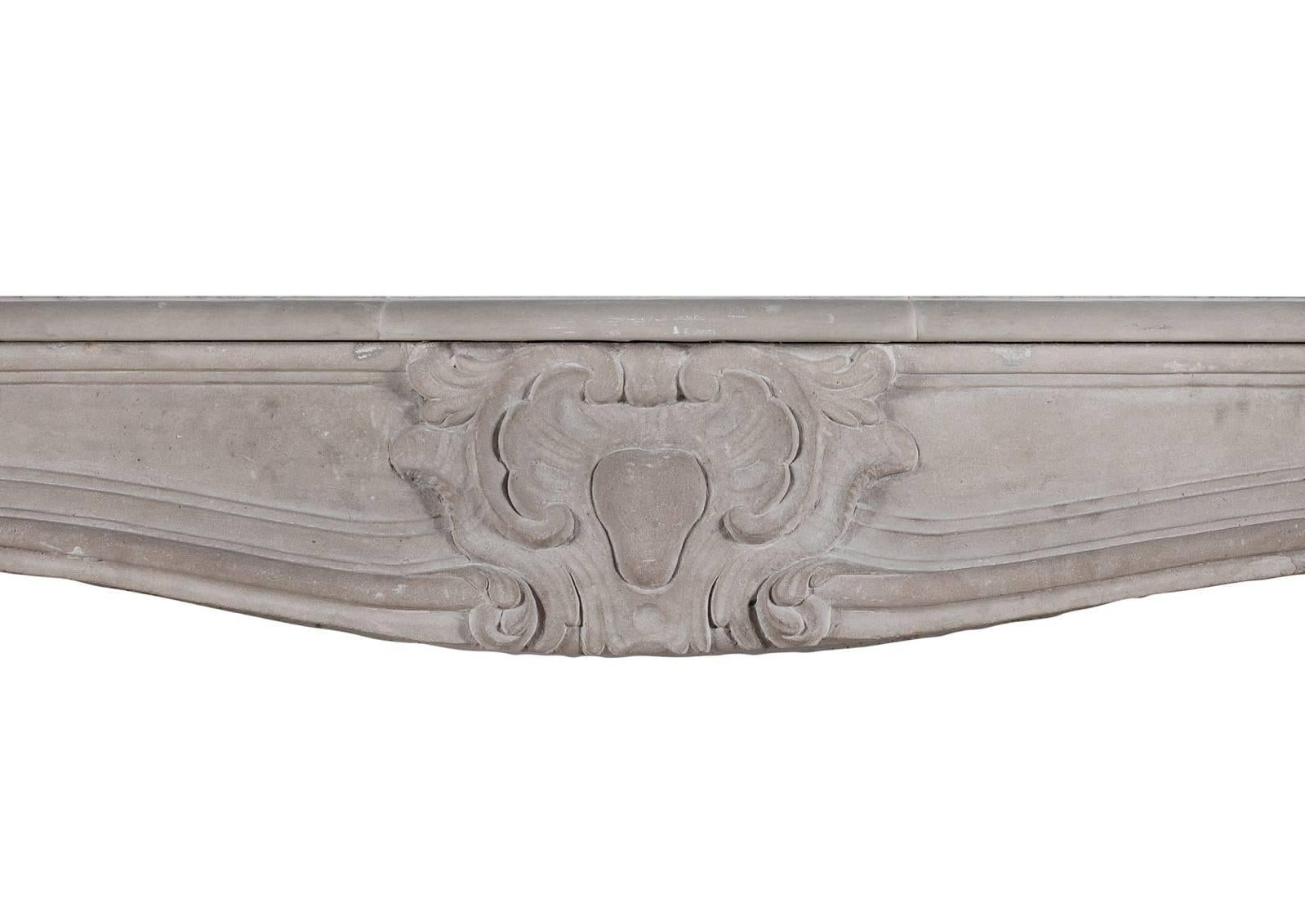 19th Century French Limestone Chimneypiece in the Louis XV Style In Good Condition For Sale In London, GB