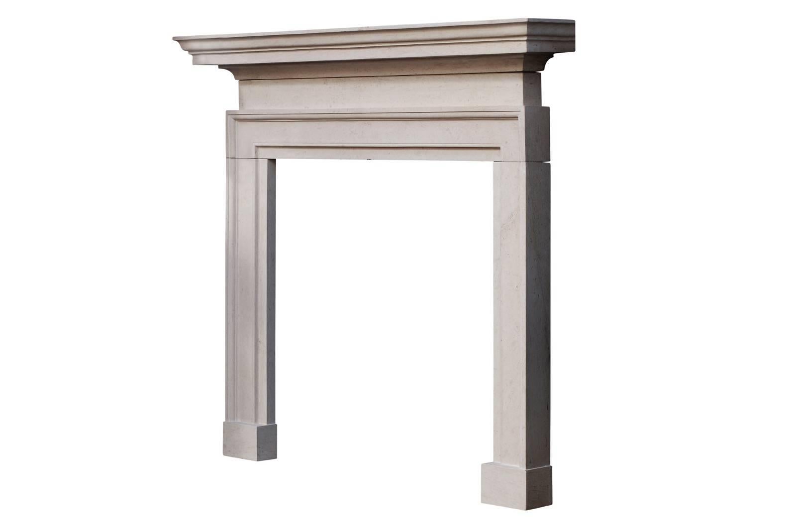 An simple limestone fireplace in the George II style in Ancaster stone. The moulded jambs surmounted by plain frieze and heavily moulded shelf. English, modern.

Measure: Shelf width 1524 mm 60 in
Overall height 1359 mm 53 ½ in
Opening height