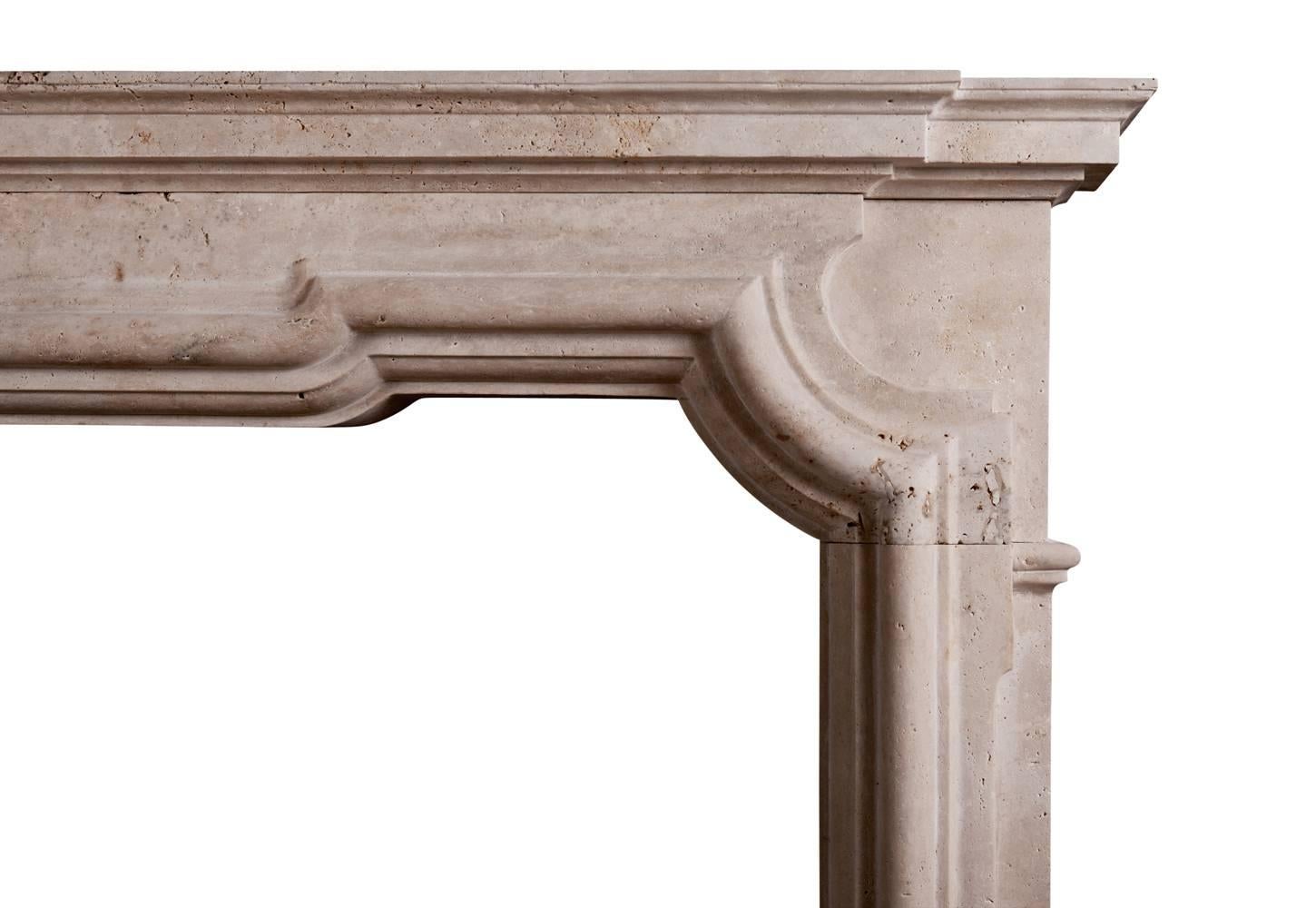 A good quality Italian fireplace in the Baroque manner in white travertine stone. The shaped frieze with heavy moulding and breakfront shelf above. A substantial piece. Modern.
N.B. May be subject to an extended lead time, please enquire for more