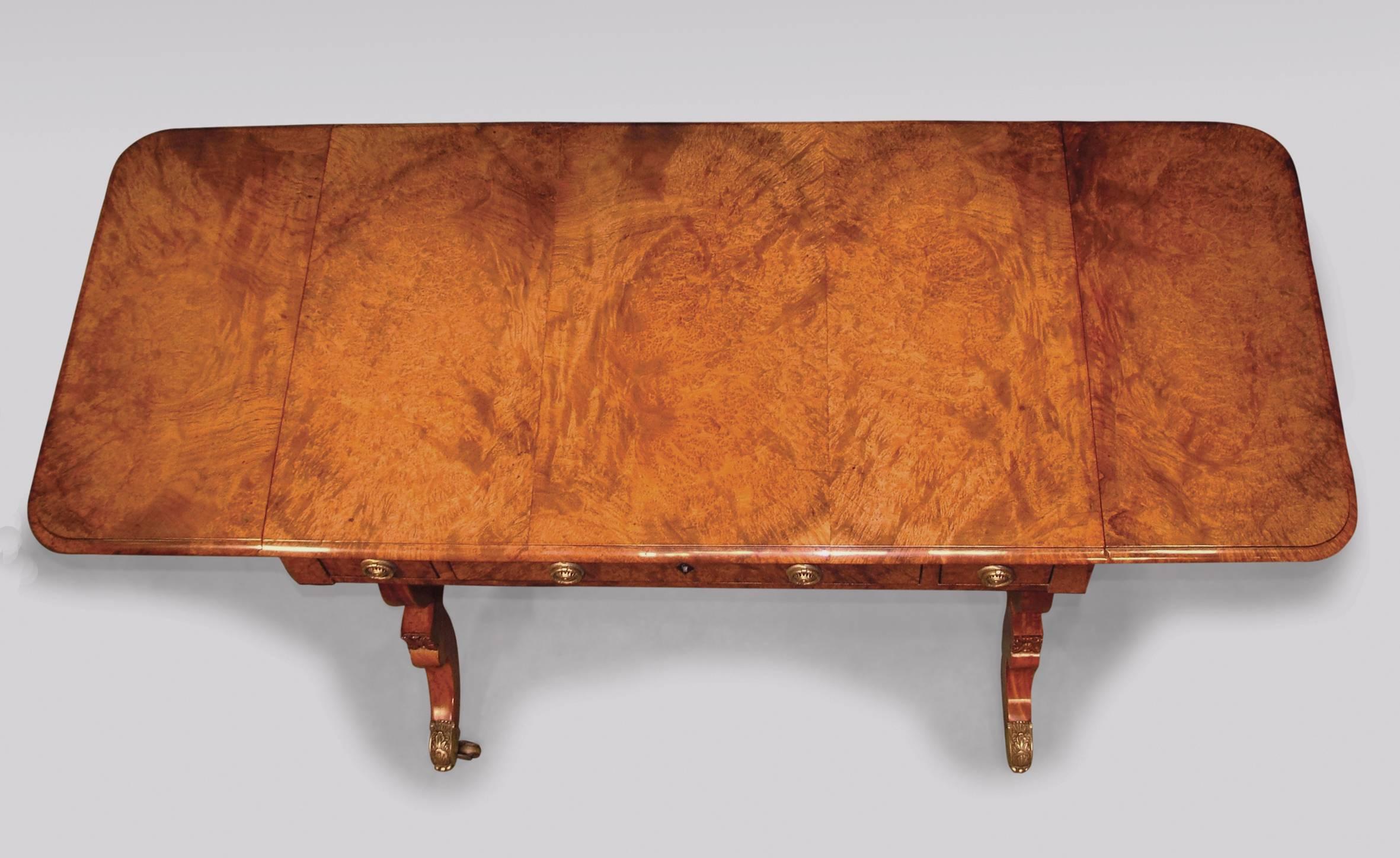 Polished 19th Century Regency Amboyna Sofa Table