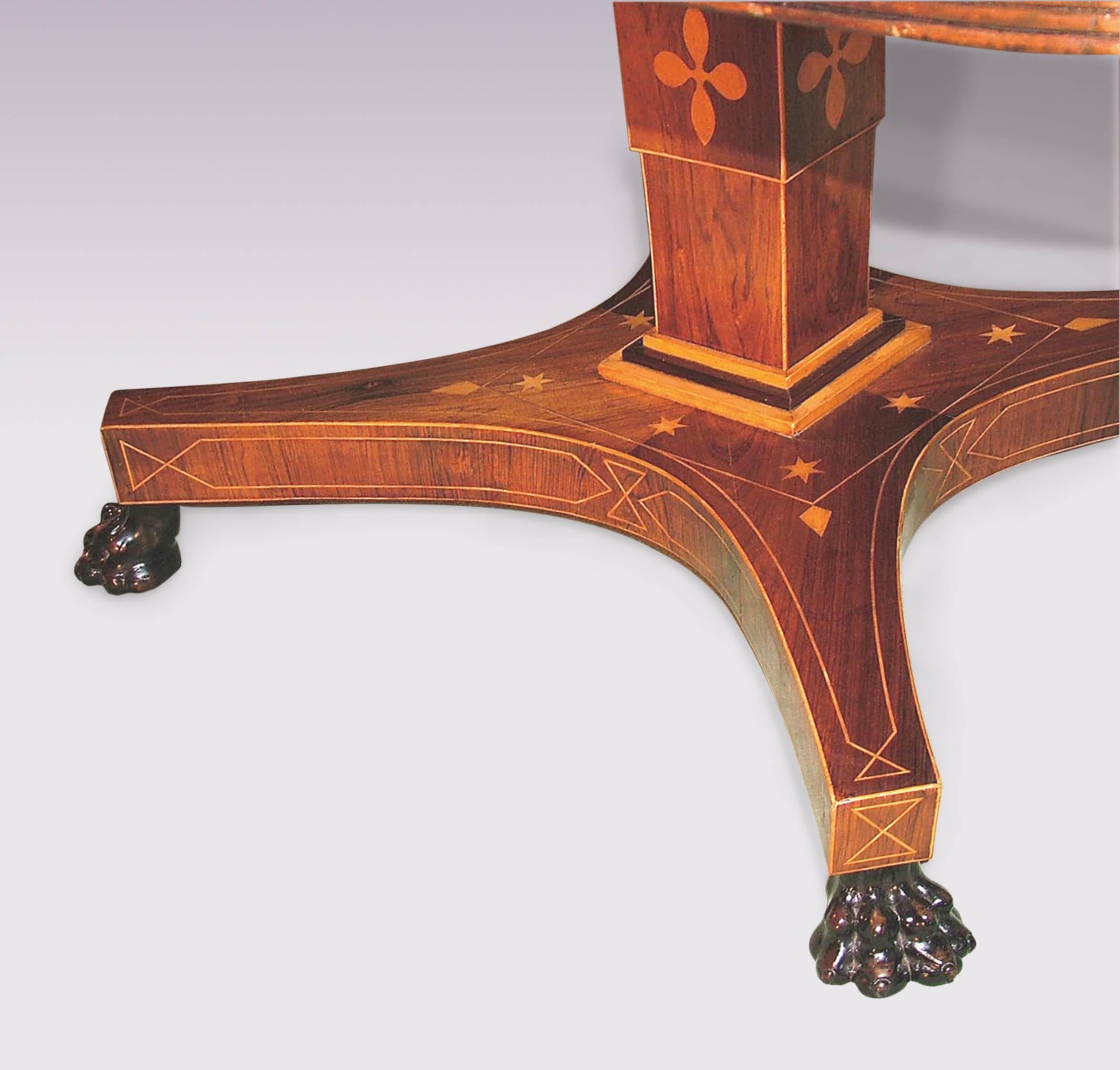 A fine early 19th century Regency period rosewood Breakfast Table having reeded edged ,satinwood crossbanded ,boxwood and ebony strung rectangular top raised on rectangular column with floral inlaid collar, and boxwood star and line inlaid platform