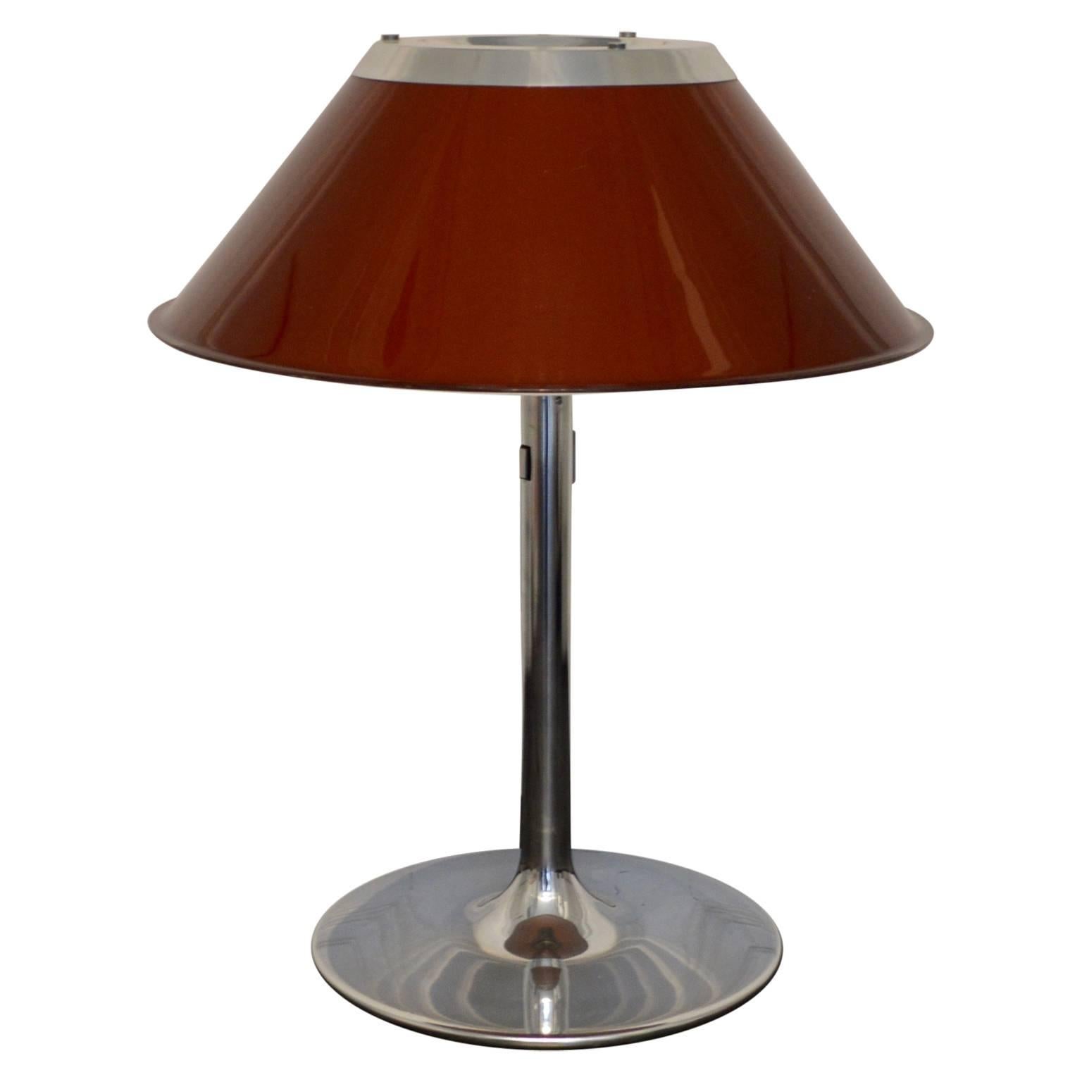 Swedish Atelje Lyktan table lamp designed by Per Sundstedt.
The shade is made of plastic with an perforated aluminium top and the foot is made of chromed steel.