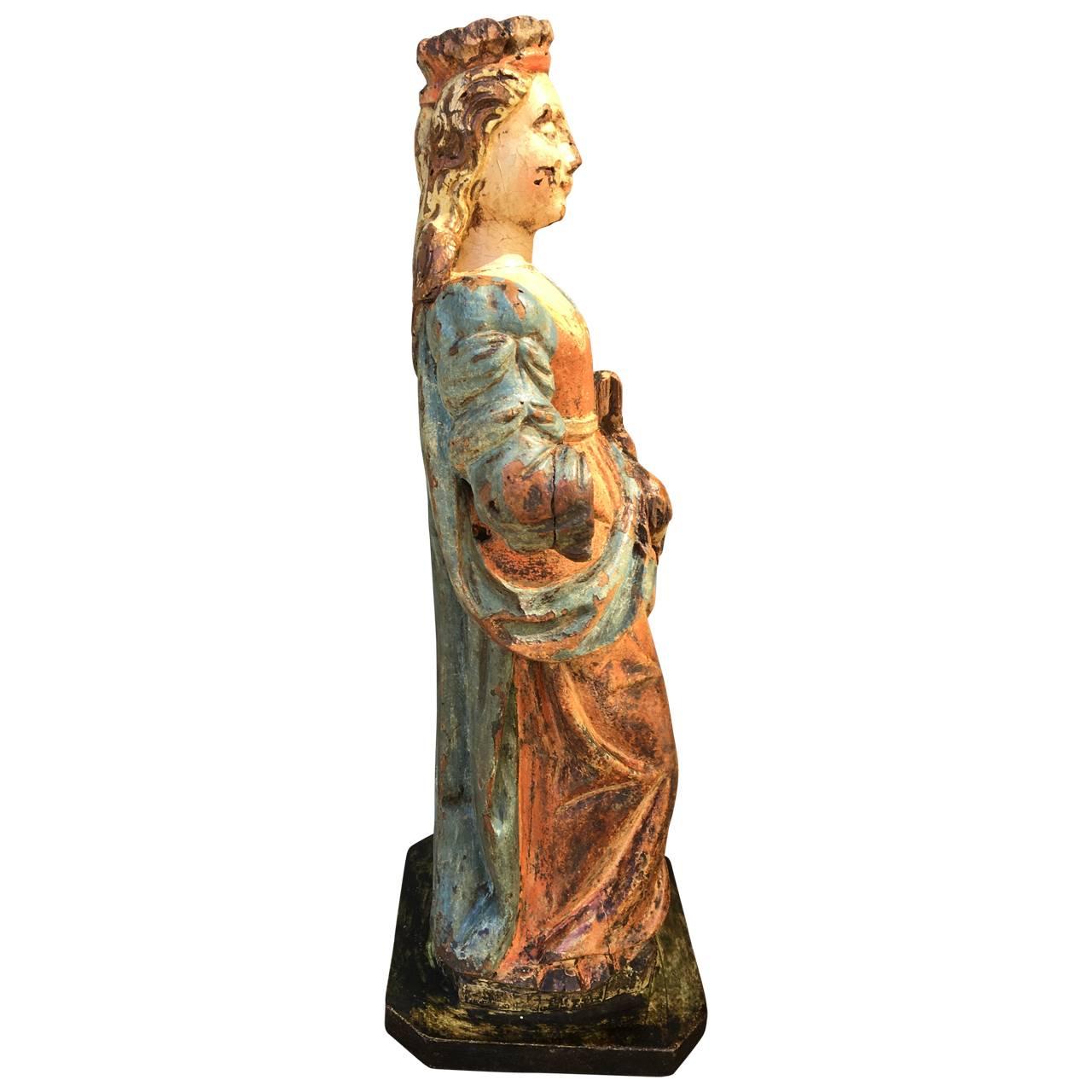 Amazing Baroque sculpture of a woman wearing a crown in original paint. Her hands are missing. Colors are untouched, recently cleaned off from a thick dark coating, I have images from before cleaning.