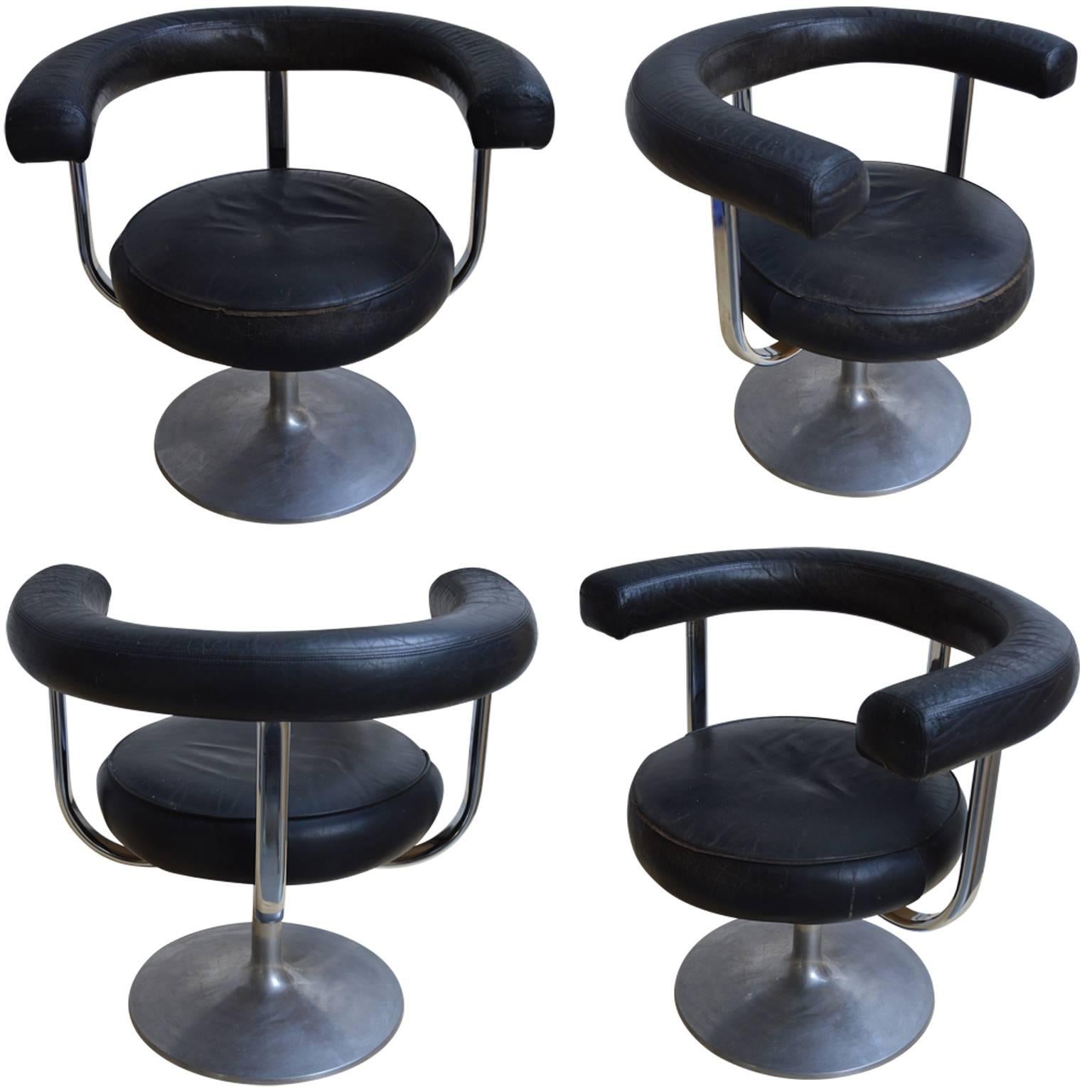 Four great looking swivel leather and chrome horse-shoe shaped armchairs.
The chairs will arrive in New Jersey in the beginning of december.