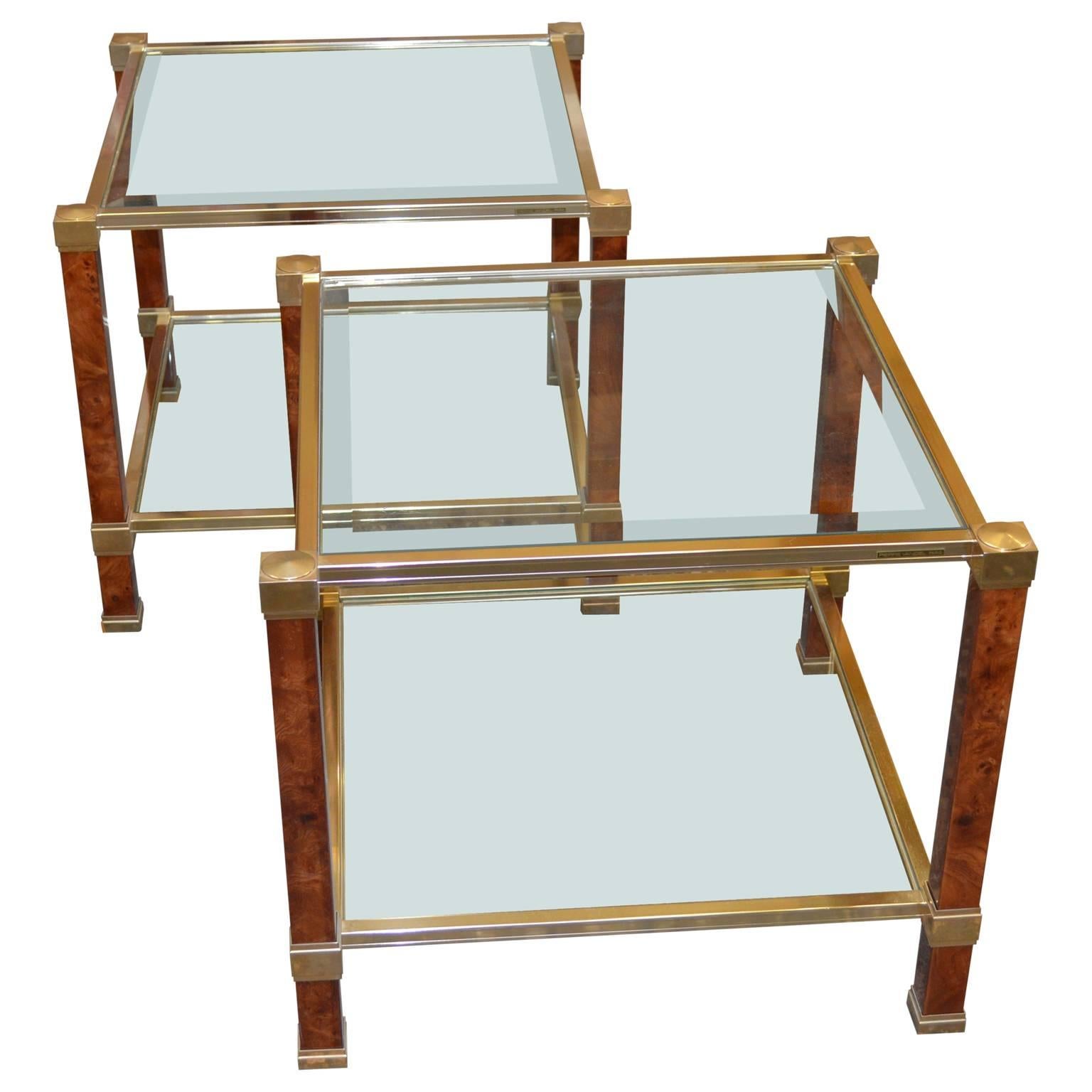 This brass and glass cocktail, or coffee table, comes with a beveled glass top, and side tables, or lamp tables, comes with two tiers of beveled glass and they all features beautiful legs in bamboo maple look.
The table is signed and papers of