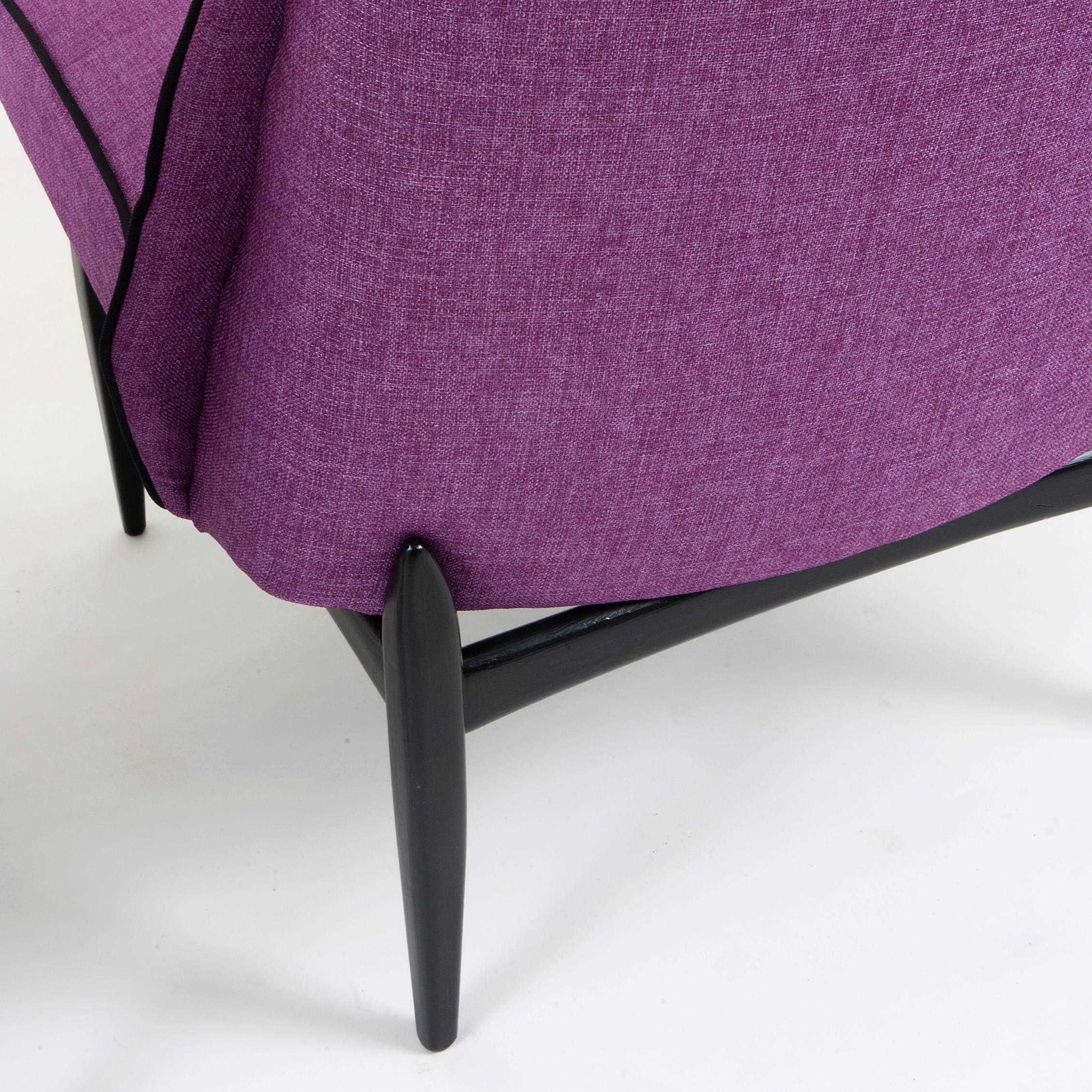 Pair of Italian slipper chairs with violet upholstery and ebonized legs.
  