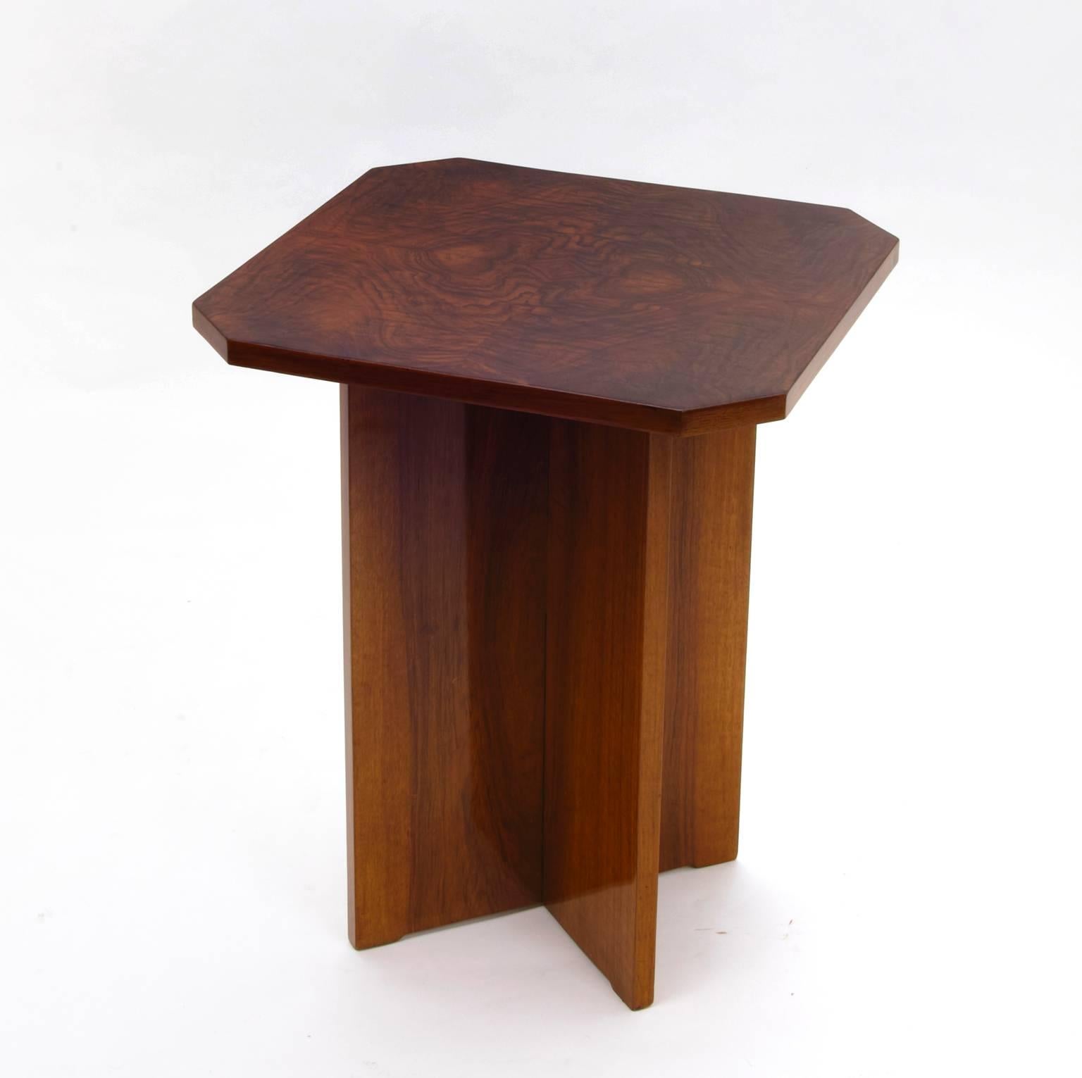 Art Deco side table with octagonal tabletop and X-shaped footing.