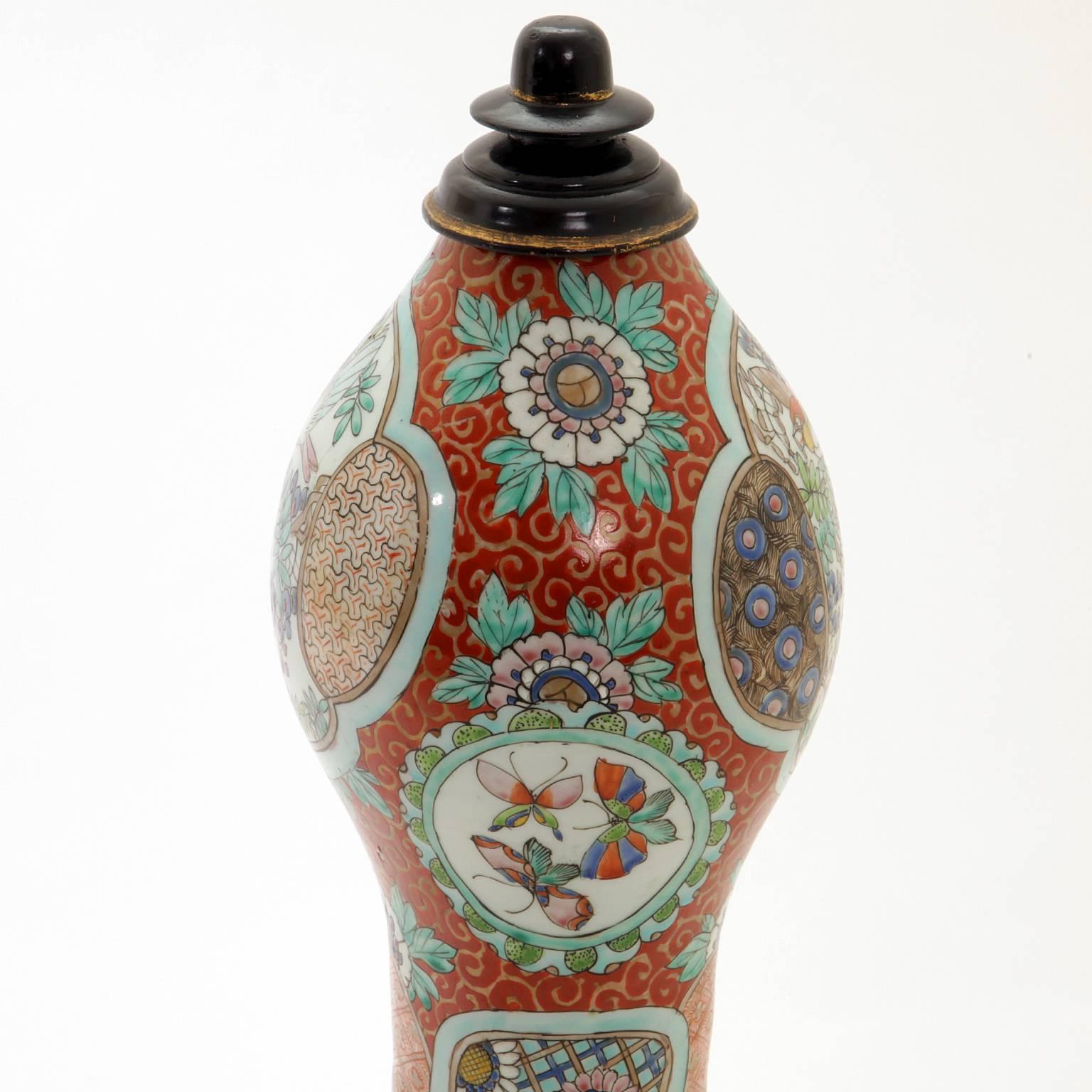 Large Japanese Gourd bottle with polychrome birds and insects decor. Carved wooden plug and stand. Height without stand: circa 63 cm