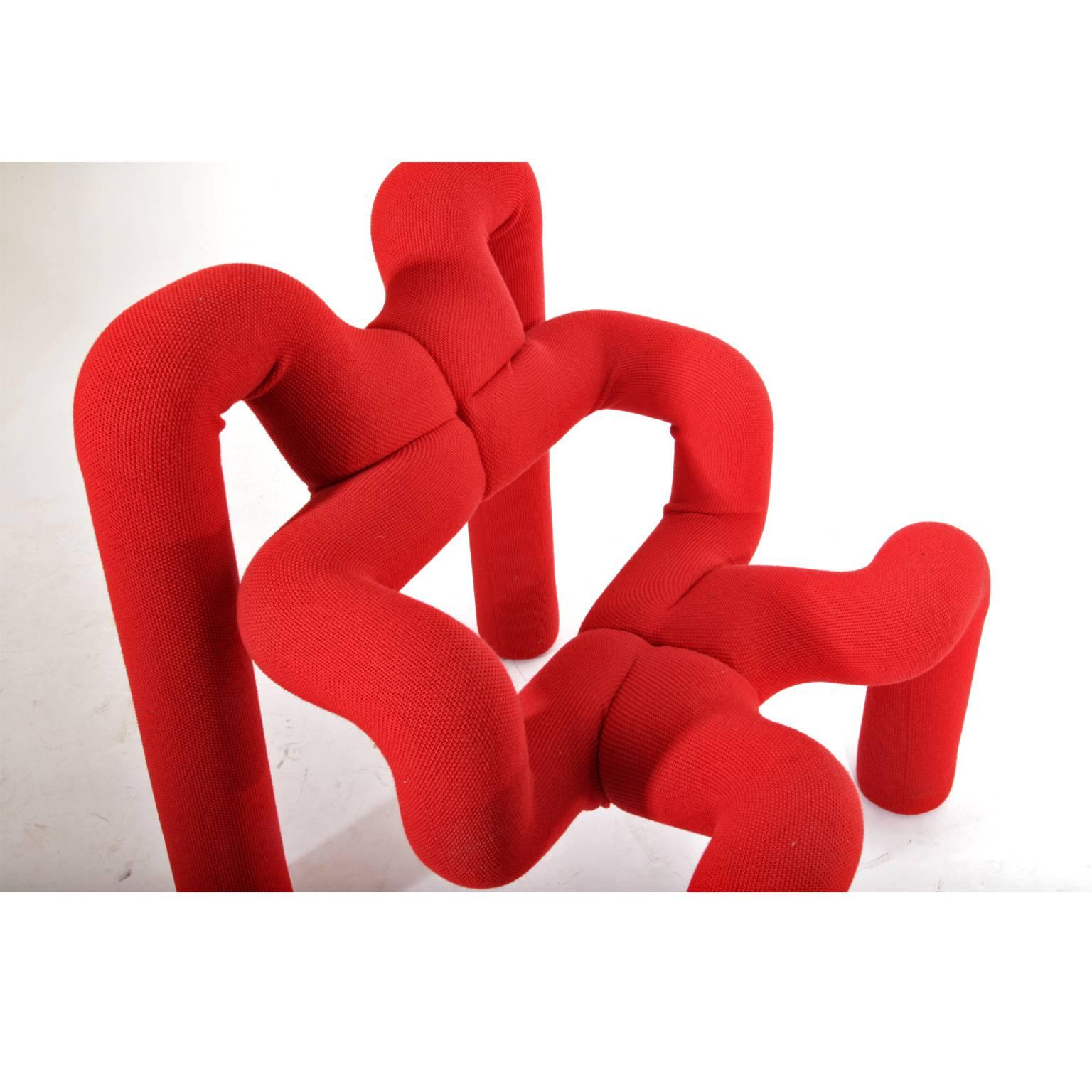 Unusual armchair by the Norwegian designer Terje Ekström. The model is from the year 1972, the chair was in production at Stokke Mobler since the 1980s. Organically fromed, completely upholstered frame in a red fabric.