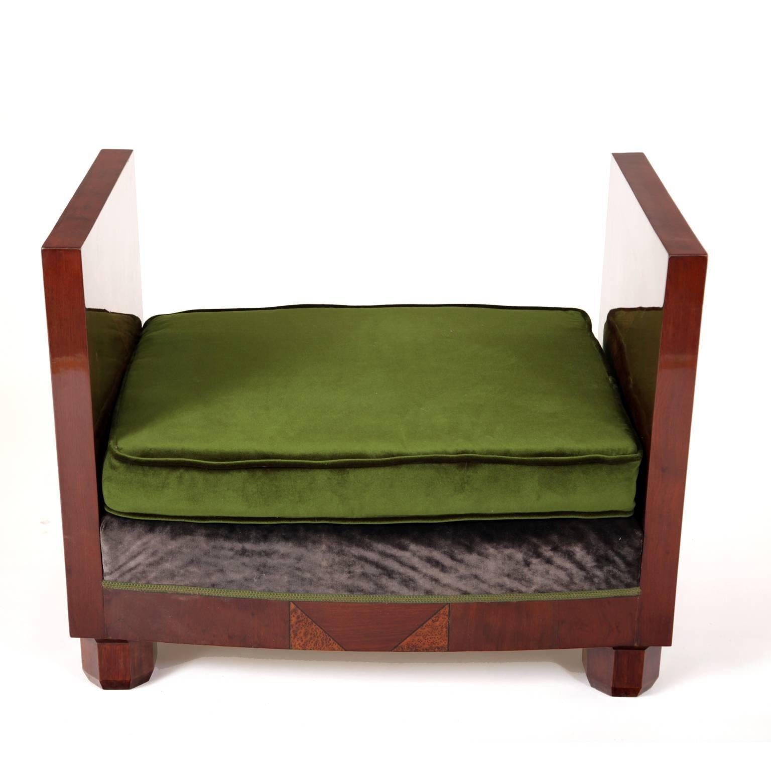 Small Art Deco bench on octagonal feet with green velvet upholstery and geometrical inlays on armrests and skirt.