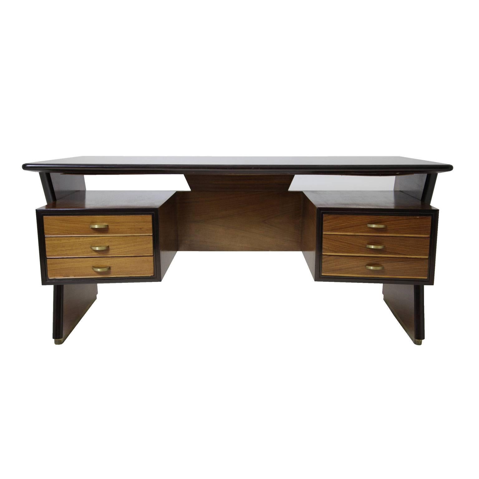 Wonderful Italian Designer Desk, dating from the 1940s. With black glass top and six drawers.
