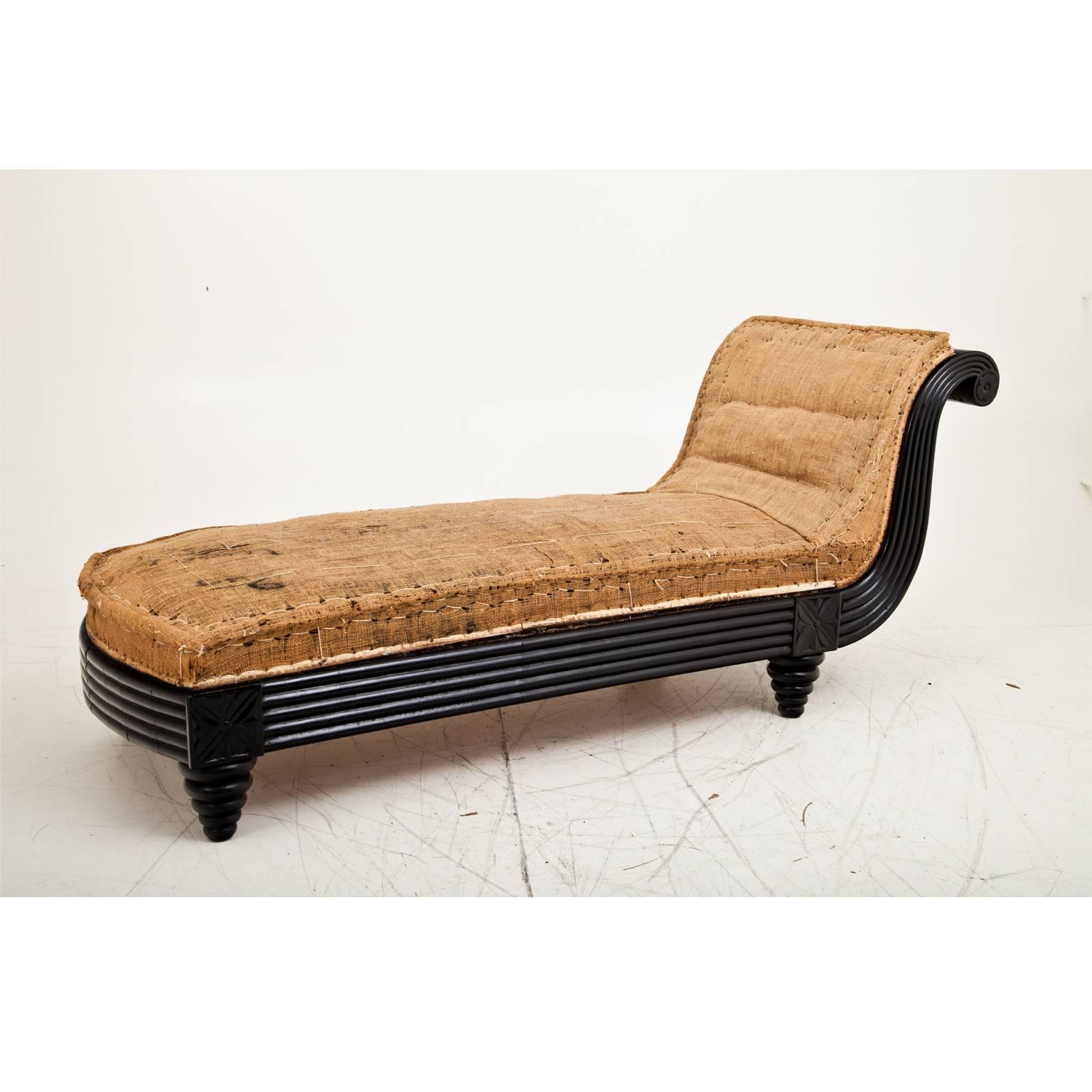 Very beautiful Italian chaise longue on cone-shaped legs, with an all-over fluted frame. The recliner is in an original condition, the legs haven been restored.