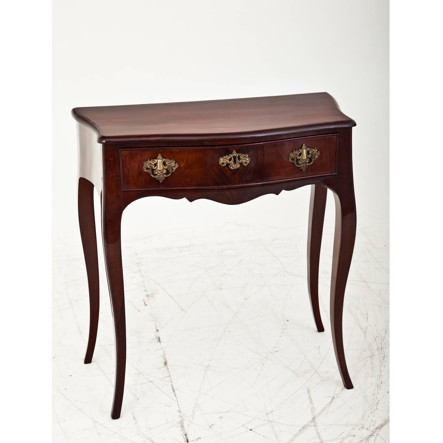 One-drawer Louis Quinze console table on S-shaped elegant legs and cut-out frame. The front and sides have a slight serpentine shape.