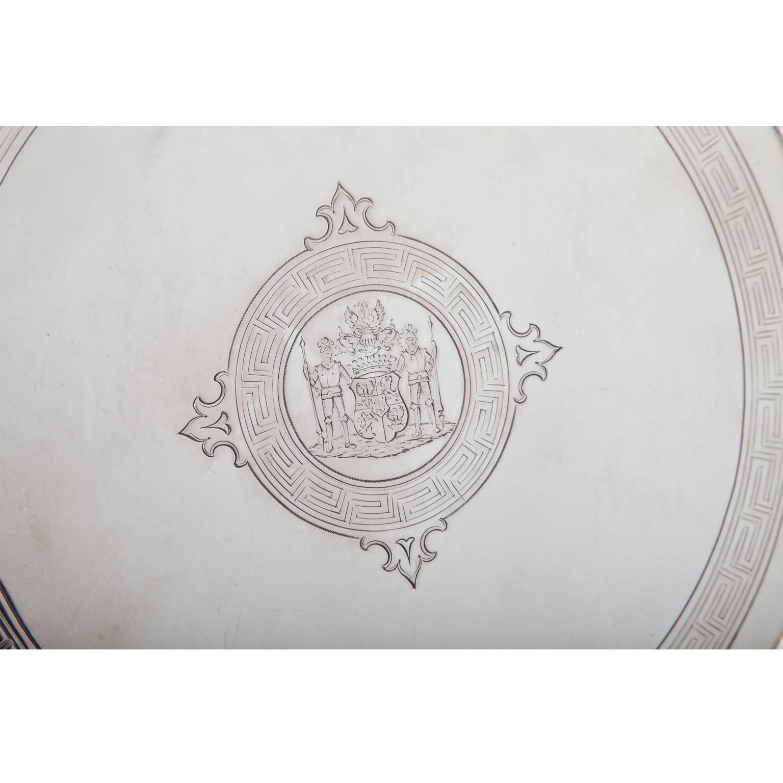 Large silver plate with the coat of arms of the Westarp Family (nominated as Prussian Counts in 1810) on the well and a revolving Meander ornament. Embossed at the back for Berlin, circa 1870, F, and WILM, president at the time was Hermann Julius