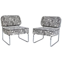 Pair of Modernist Lounge Chairs, black and white pattern, reupholstered, 1960s