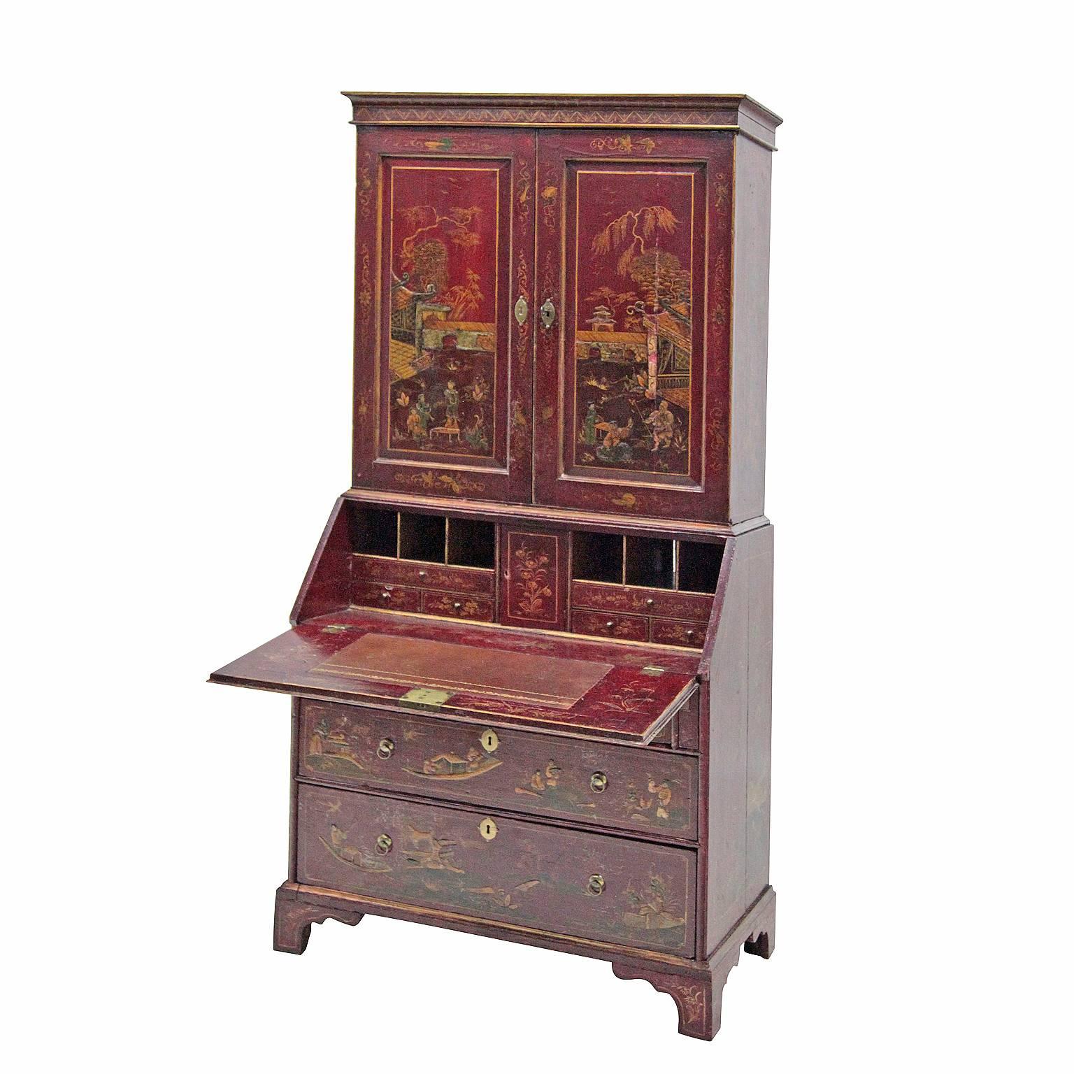 The lacquered Secretary Desk stands on four feet and is decorated with polychrome Chinese sceneries and has a chest of drawers lower part with four drawers. The writing surface is on a height of 76 cm and reveals several pigeon holes and drawers.