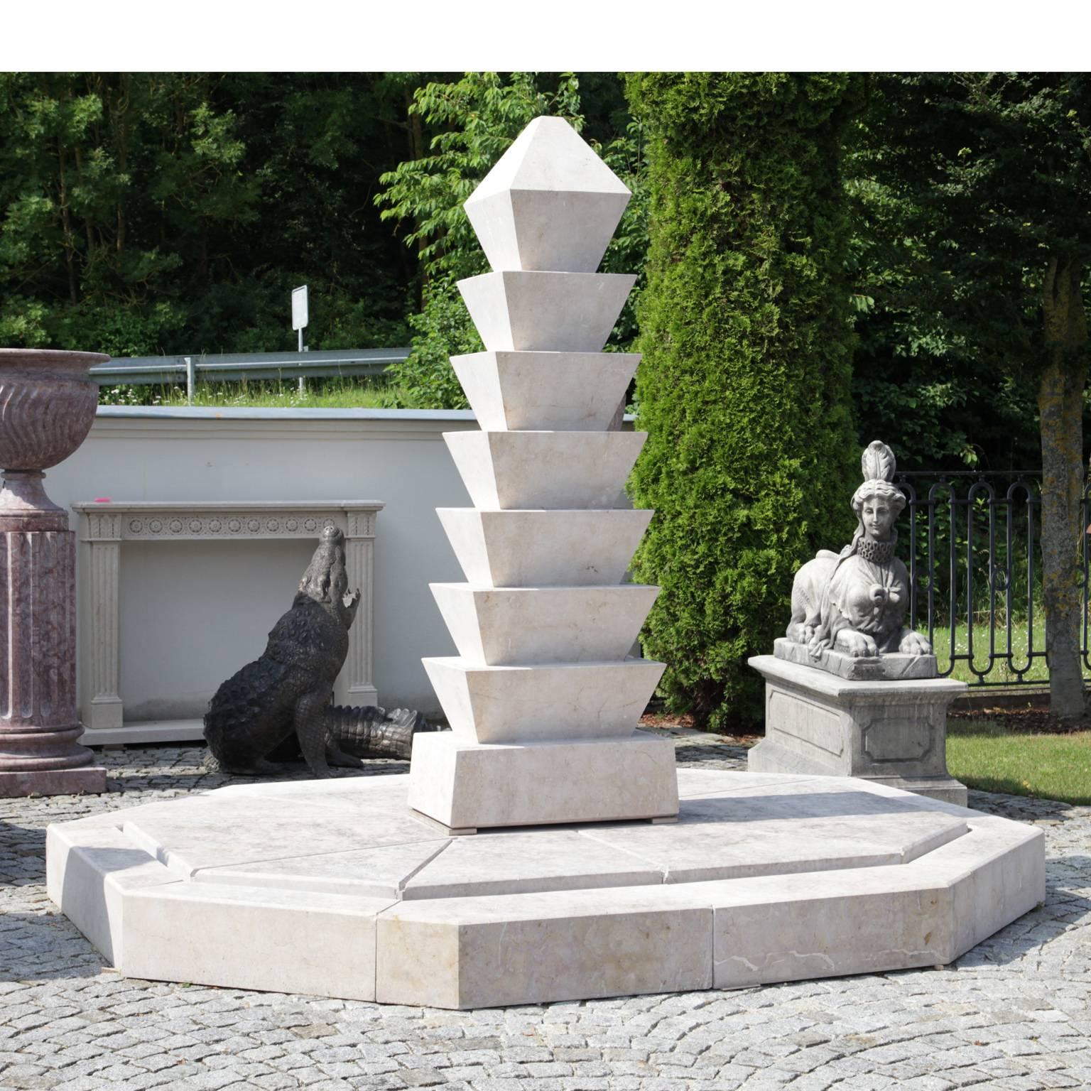 A large modern fountain with a height of 255cm. The surface is very fine. This piece is a unique handcrafted fountain.