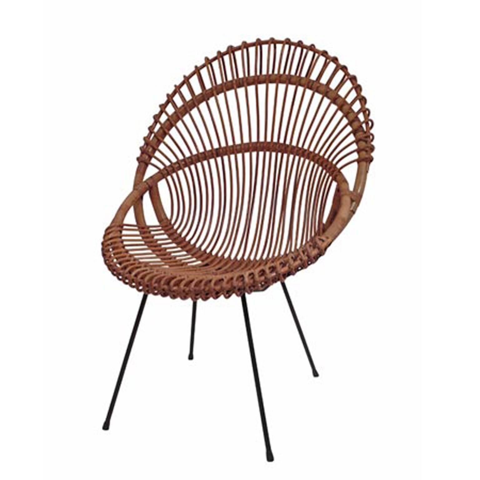 Great bucket-shaped rattan chair on dainty iron legs. From the 1970s. The wicker is in a good condition.