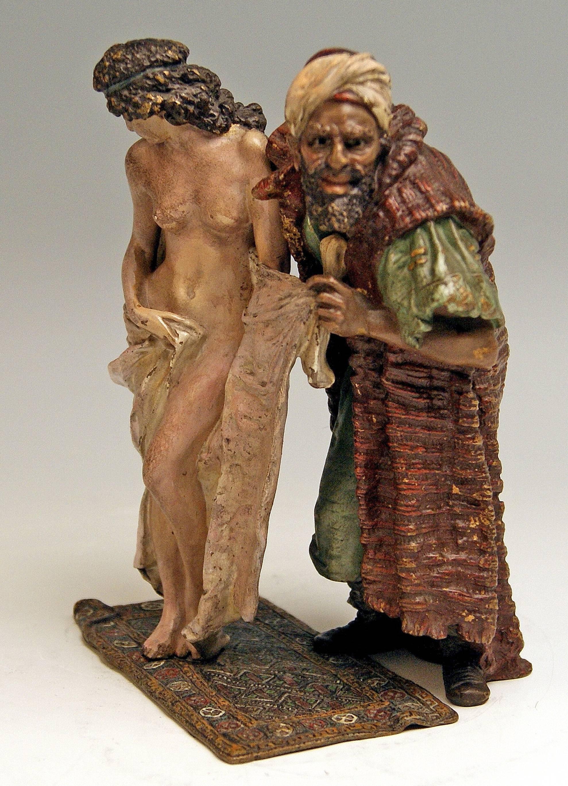 Stunning bronze figurine group: Arab man with female nude the slave trader
 
This excellent Vienna bronze figurine group is of finest manufacturing quality:
An Arab bearded old man wearing turban and long mantel stands behind a female nude,