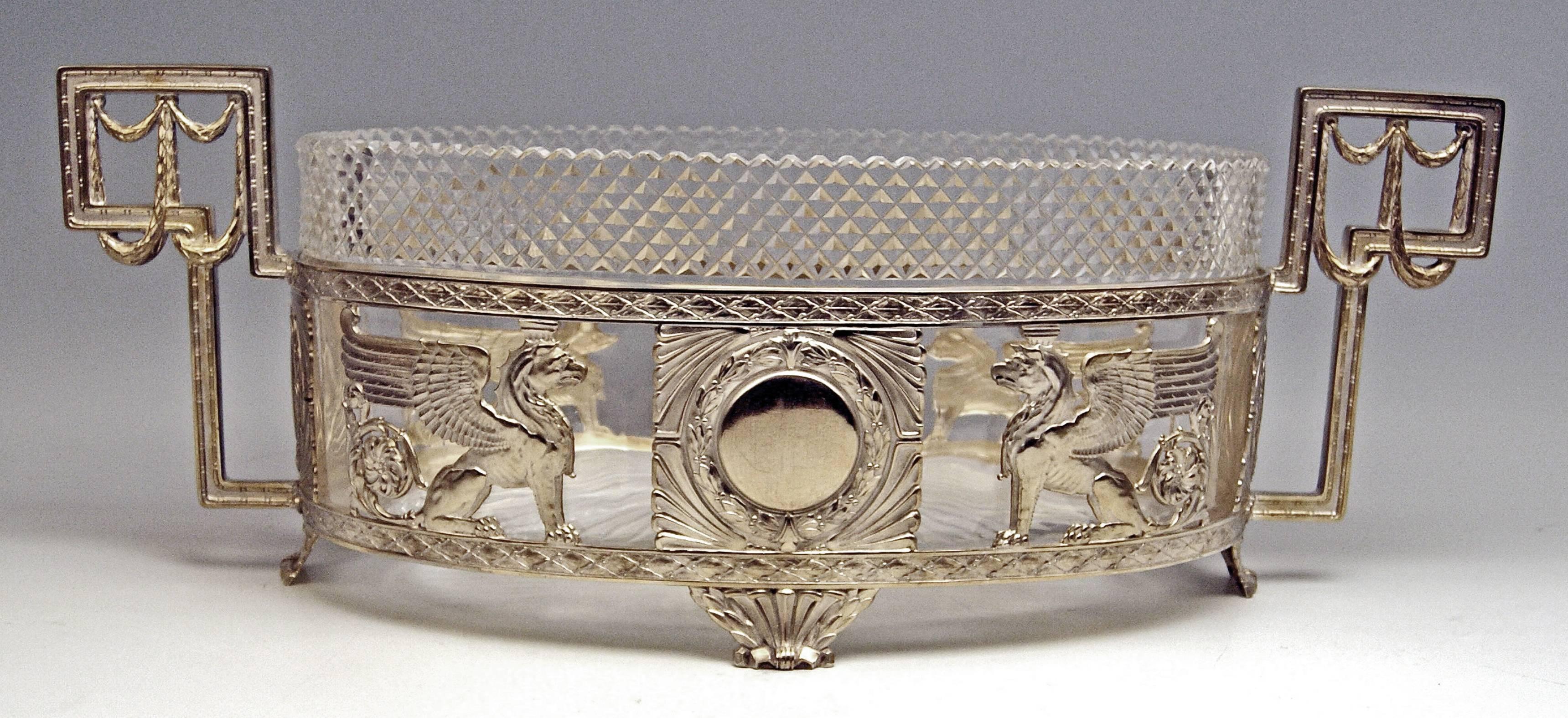Silver 800 German guge flower bowl or centrepiece with original gorgeous glass liner
width: 52.5 cm (= 20.66 inches)!

Art Nouveau (made circa 1890)
Silver 800
Branded by German Crescent with Crown
Manufactory mark: 
KOCH & BERGFELD, Bremen
