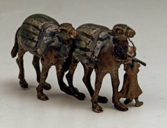 Vienna Bergman'n' Bronze En Miniature Arab Man Guiding Camels, circa 1900