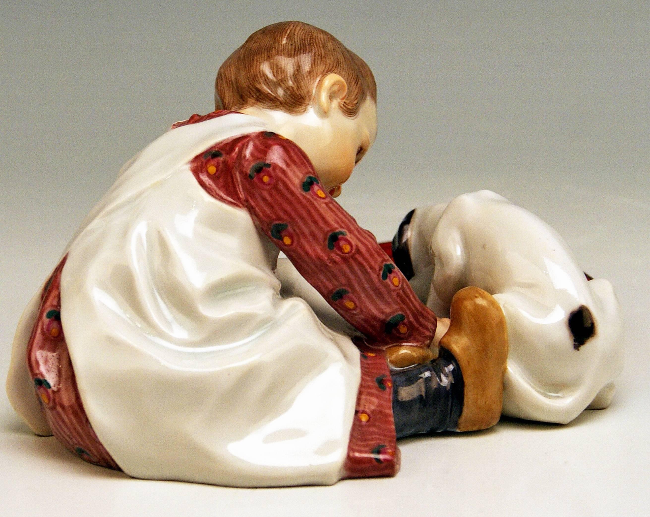 German Meissen Hentschel Child Boy Figurine with Drinking Dog Model W 123, circa 1905