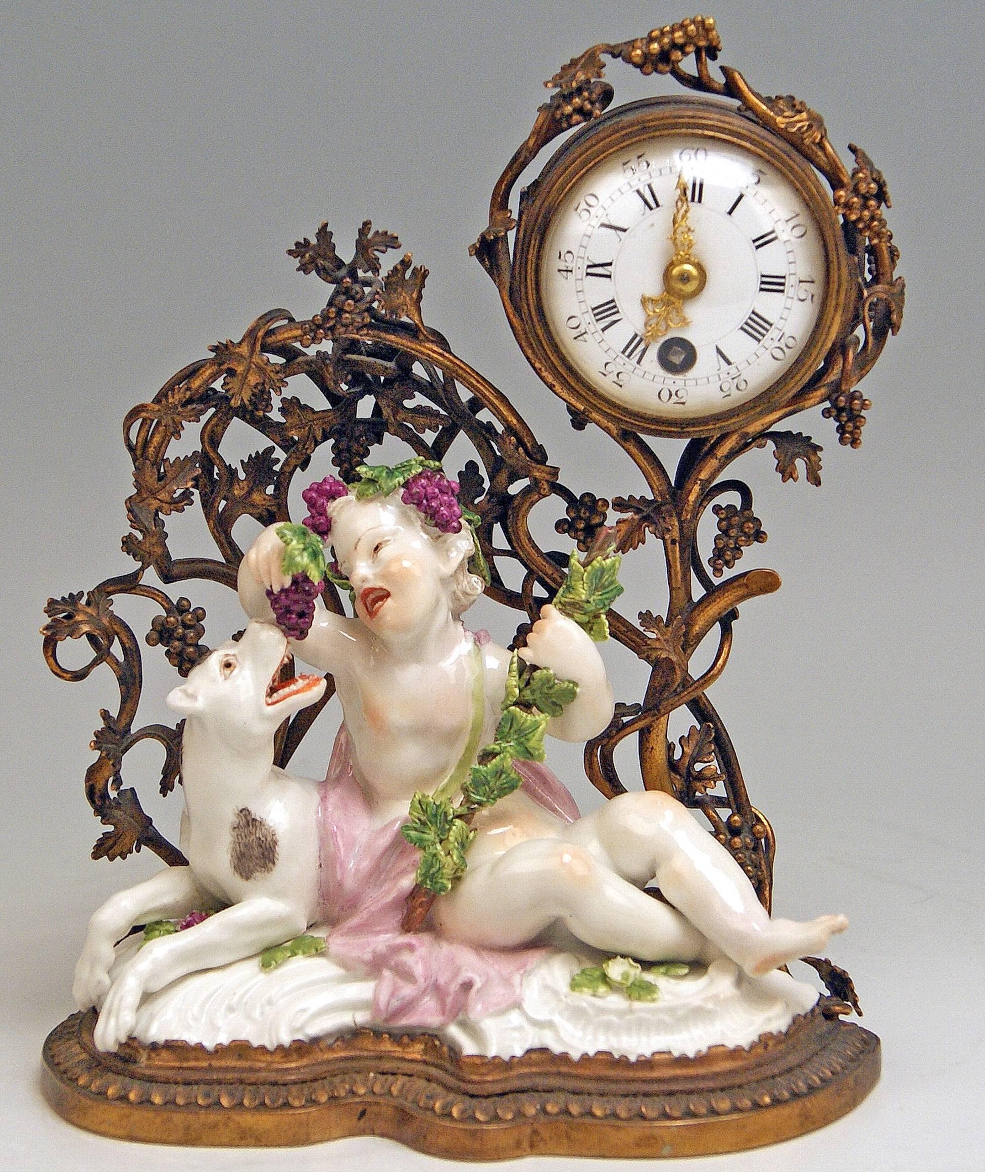 Meissen gorgeous rococo mantel / table clock made of gilded / gilt bronze, excellently decorated with sculptured figurines made of porcelain.

Manufactory: Meissen
Hallmarked: Blue Meissen Sword Mark (bottom of figurines glazed)
First