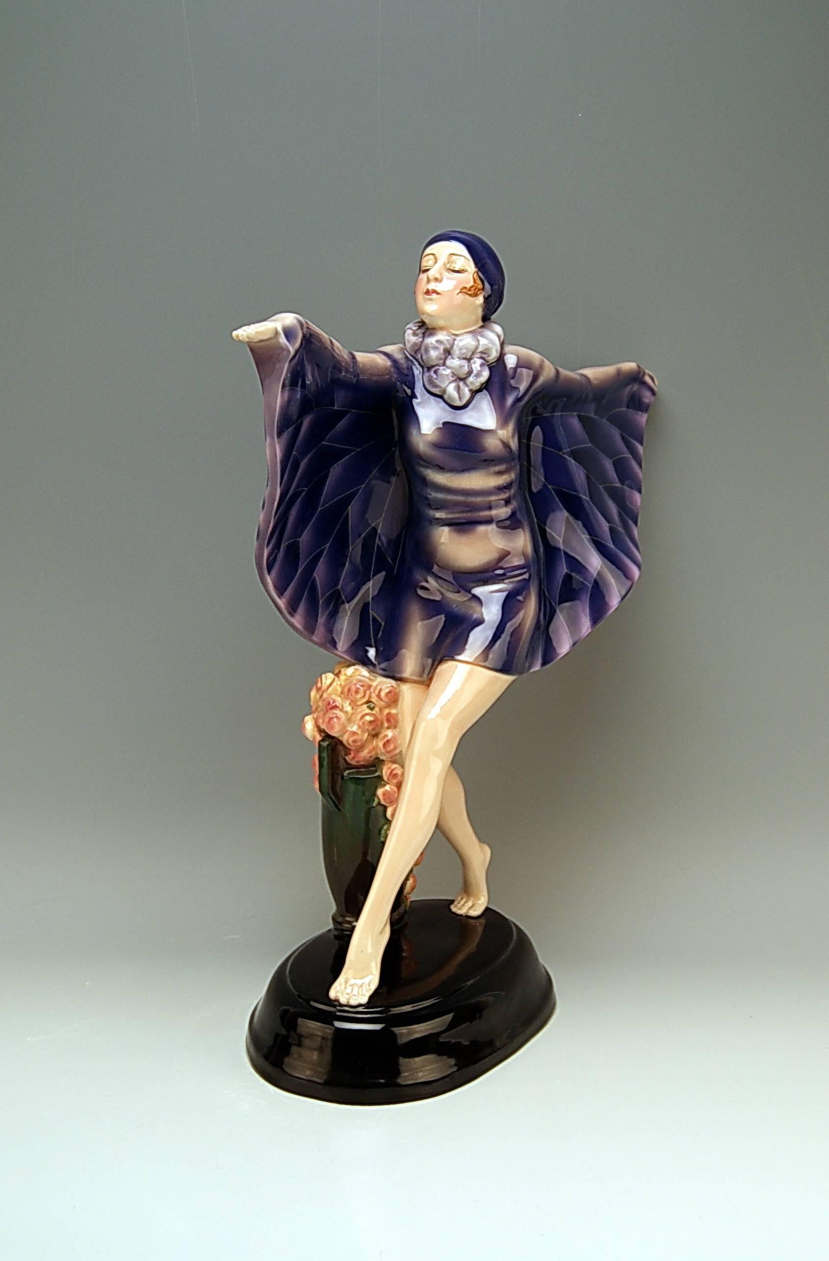 Goldscheider Vienna gorgeous dancingy lady figurine: the captured bird

Designed by Josef Lorenzl (1892-1950) / one of the most important designers having been active for Goldscheider manufactory in period of 1920-1940 / Designed 1922 (= quite