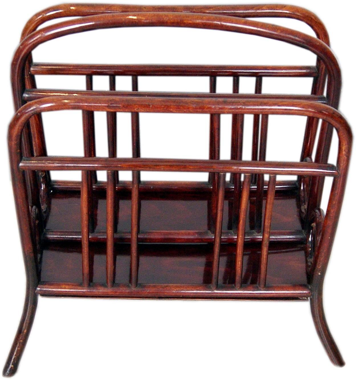 Thonet Vienna most elegant music or newspaper / magazine stand (= for holding newspapers)

Model number 33
This model was created before the year 1904 by Austrian Manufactory Thonet Brothers. 

high quality handwork / stunningly shaped bentwood