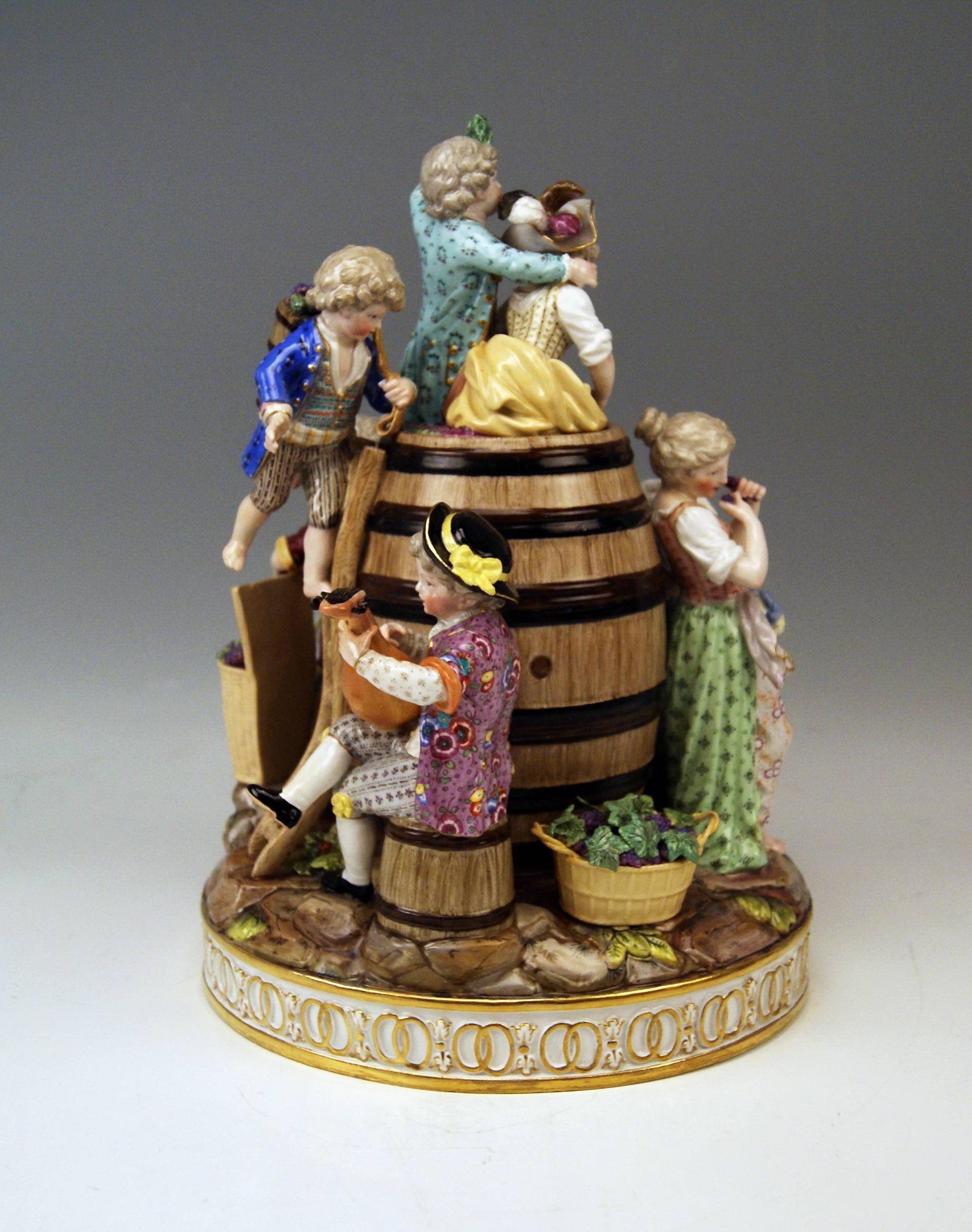 Meissen gorgeous & tall group of CHERUB FIGURINES being busy with WINE HARVEST  (SEASONS FIGURINES) assembled around a WINE CASK.

MEASURES / DIMENSIONS: 
height:  30.5 cm  ( = 12.00 inches ) 
diameter of base:  21.5 cm   ( = 8.46 inches