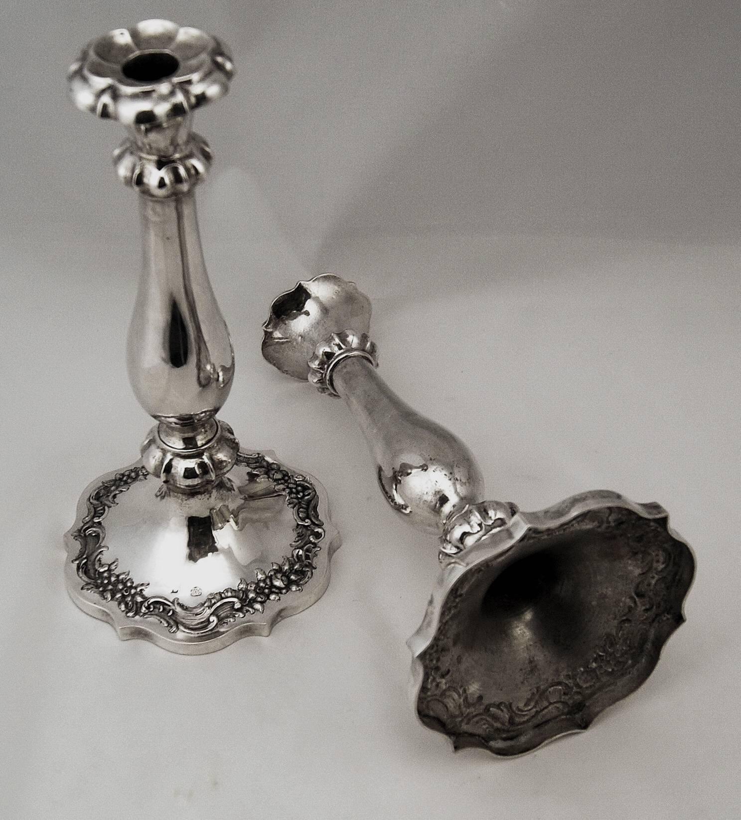 Austrian stunning Biedermeier silver pair of candlesticks
made 1846. 

Gorgeous Viennese silver pair of candlesticks of finest manufacturing quality as well as of most elegant appearance: These candlesticks were made during famous Viennese High