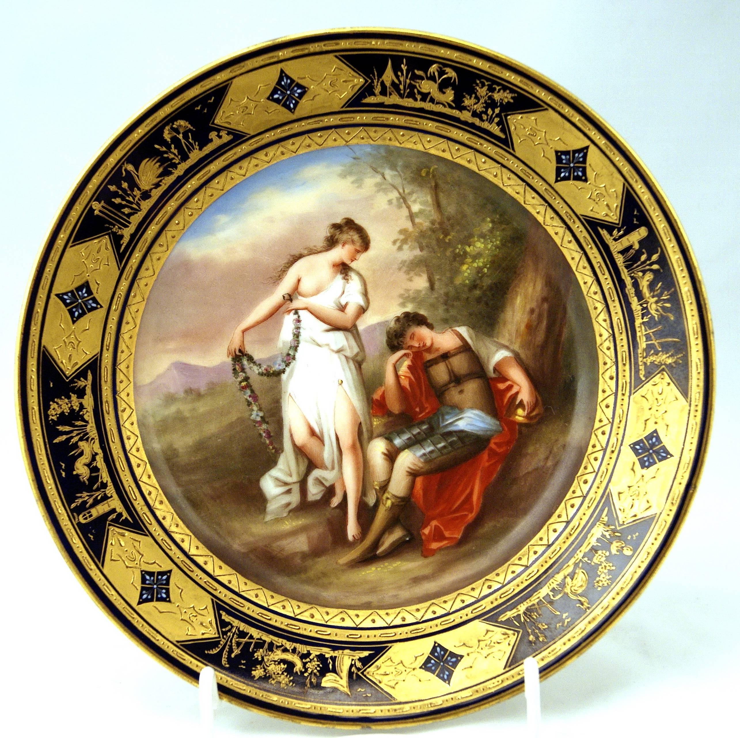 Stunning picture plate with figurines of Royal Vienna Porcelain Manufactory:
Finest quality  /  edged areas are decorated with so-said Grotesque  (Italian:  GROTTESCHI)  pattern laid on cobalt blue ground. - Material is  PORCELAIN   (multi-colored