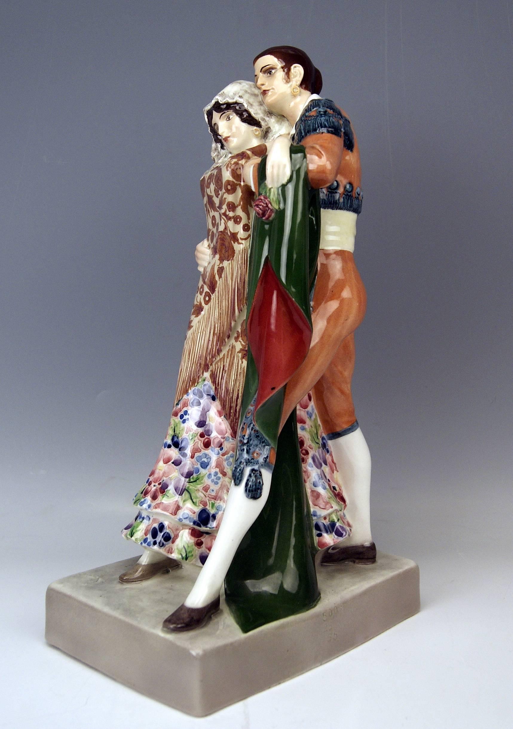 Goldscheider Vienna Dancing Spanish Couple Clad in Spanish Garments.

Model created by Karl Perl (1876 - 1965) / designed circa 1922.
Made circa 1922   (= Early Maufacturing !).
model number 5001 / 26 / 65 (= it is visible at edge of